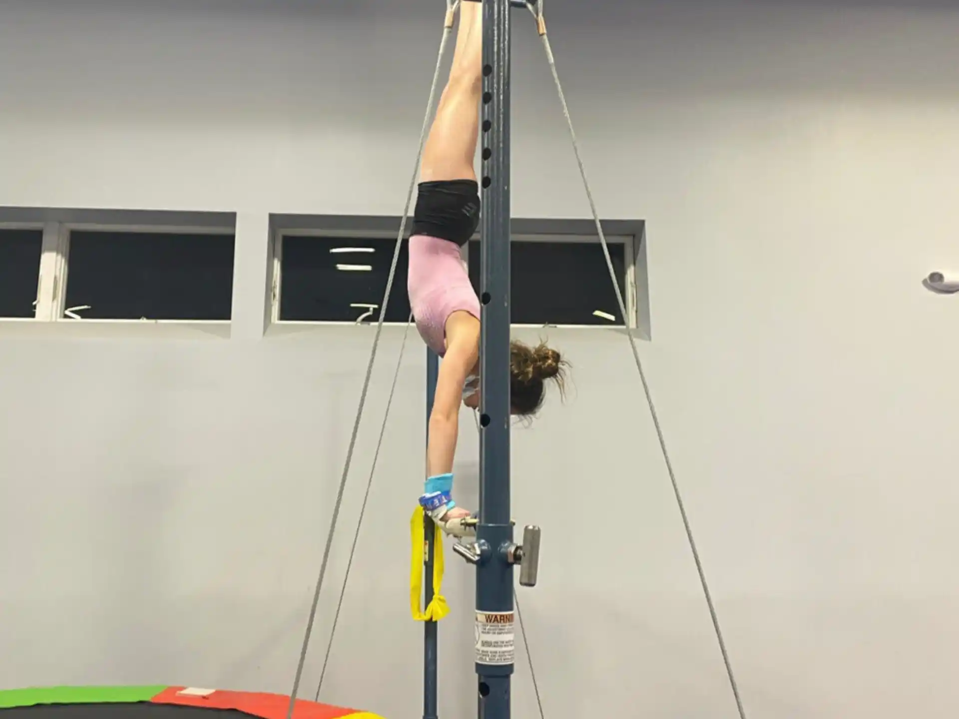 a person on a pole