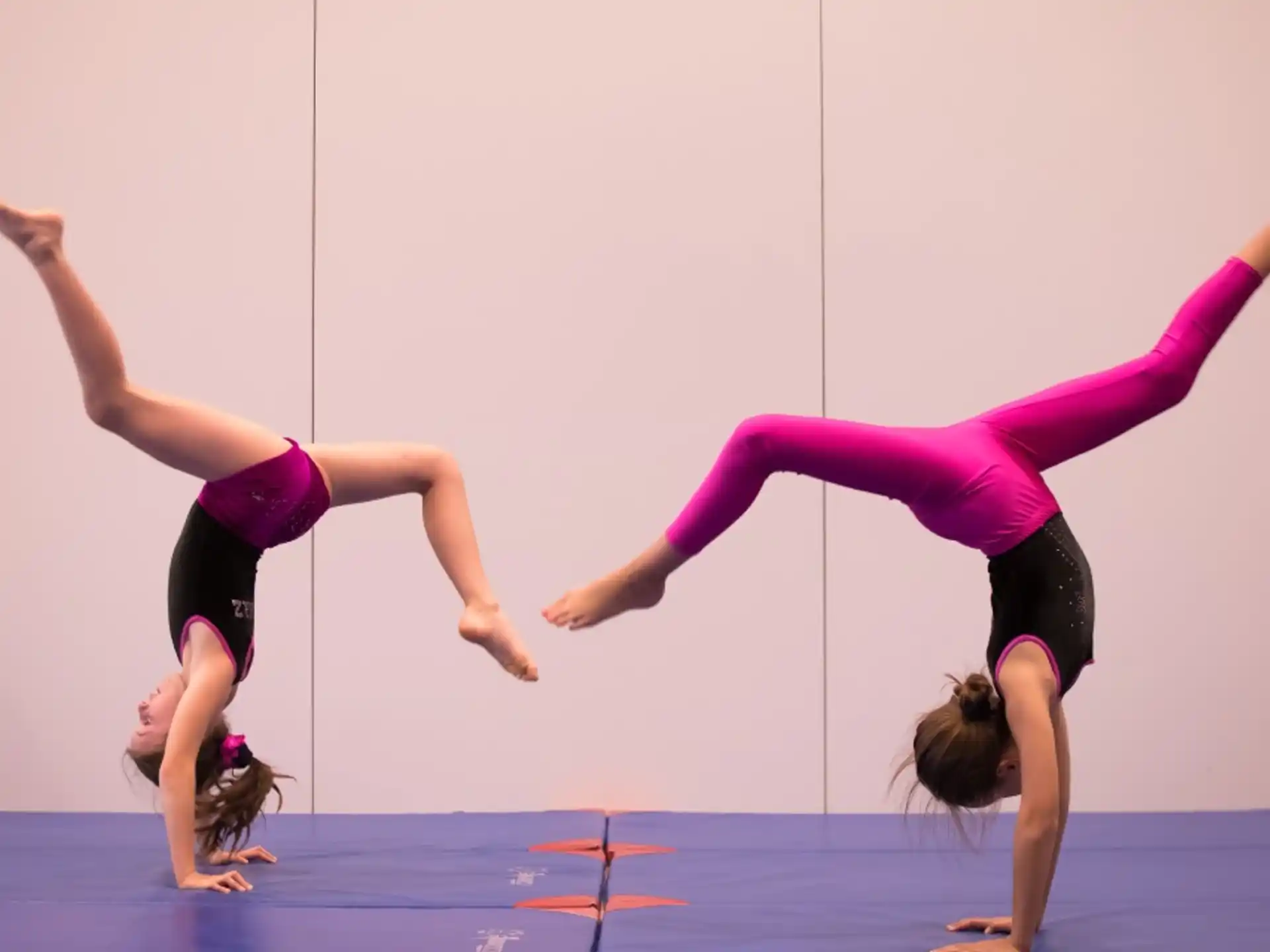 a couple of women doing yoga