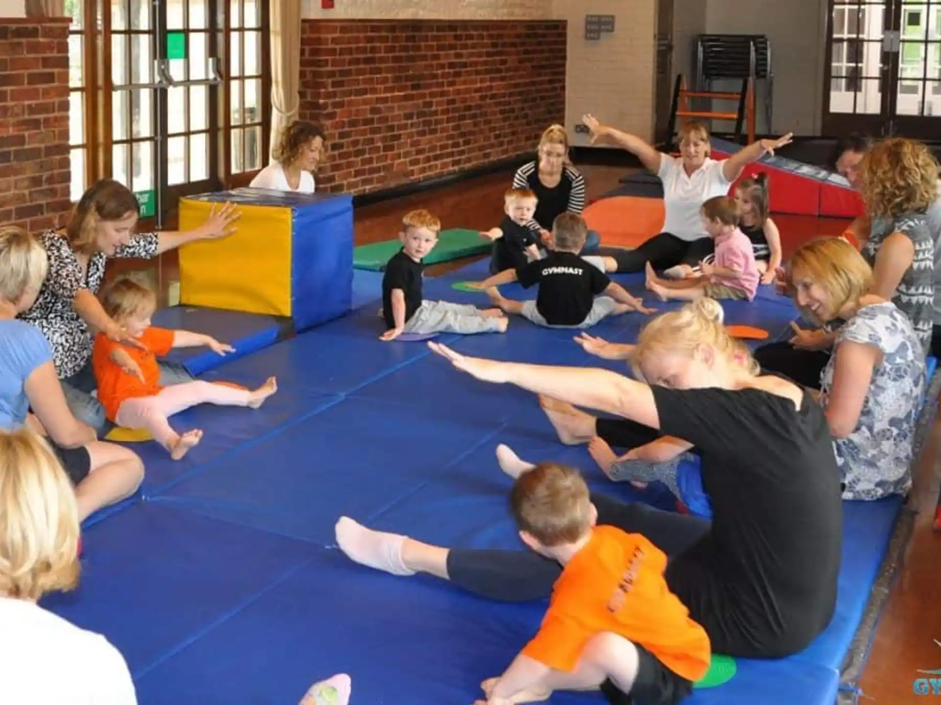 a group of children sitting on the floor