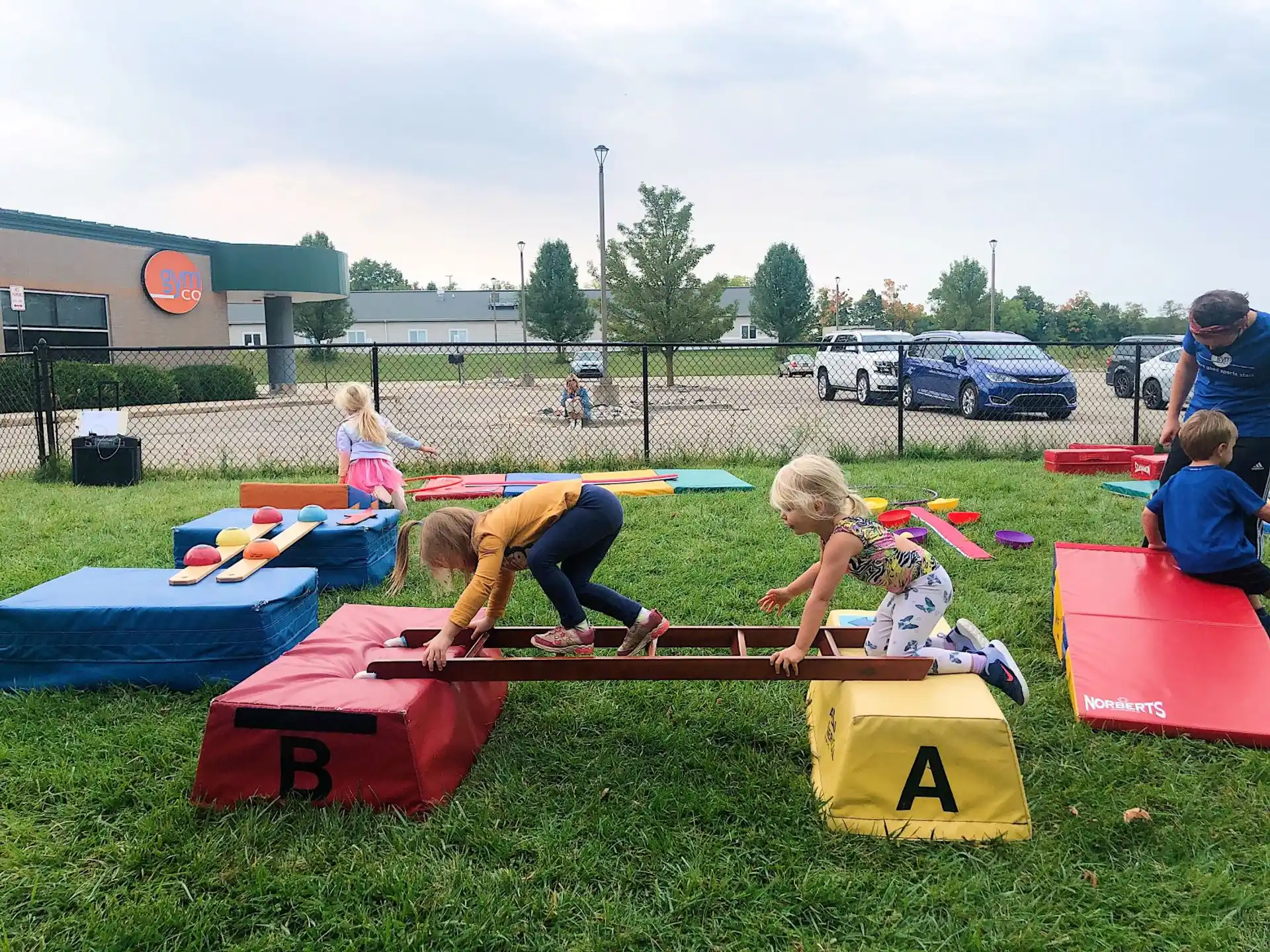 a group of people playing on mats