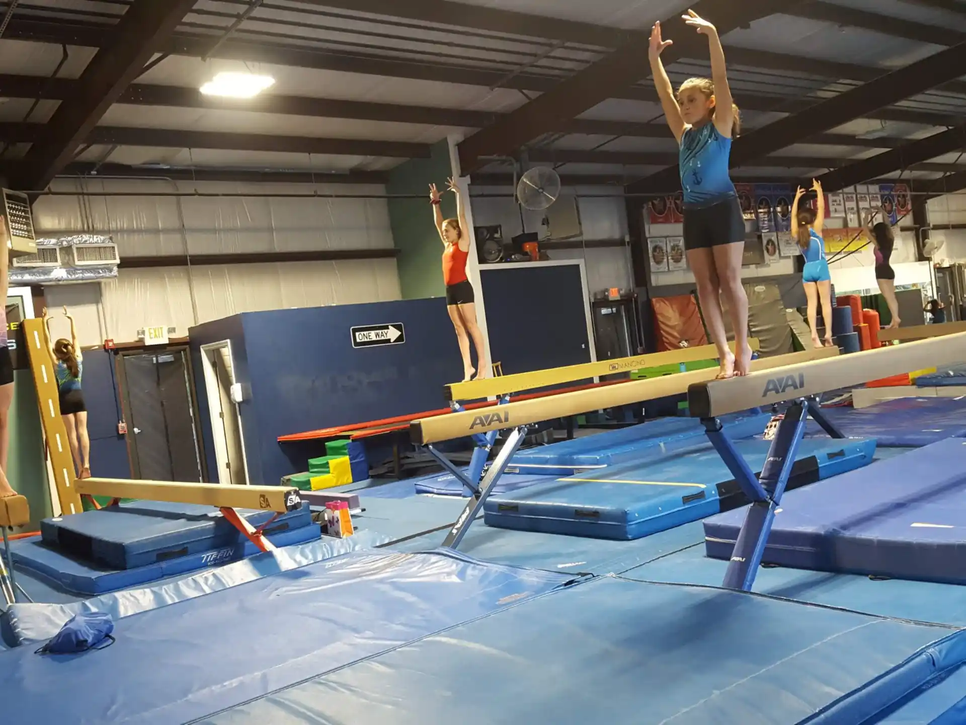 a group of people standing on a trampoline