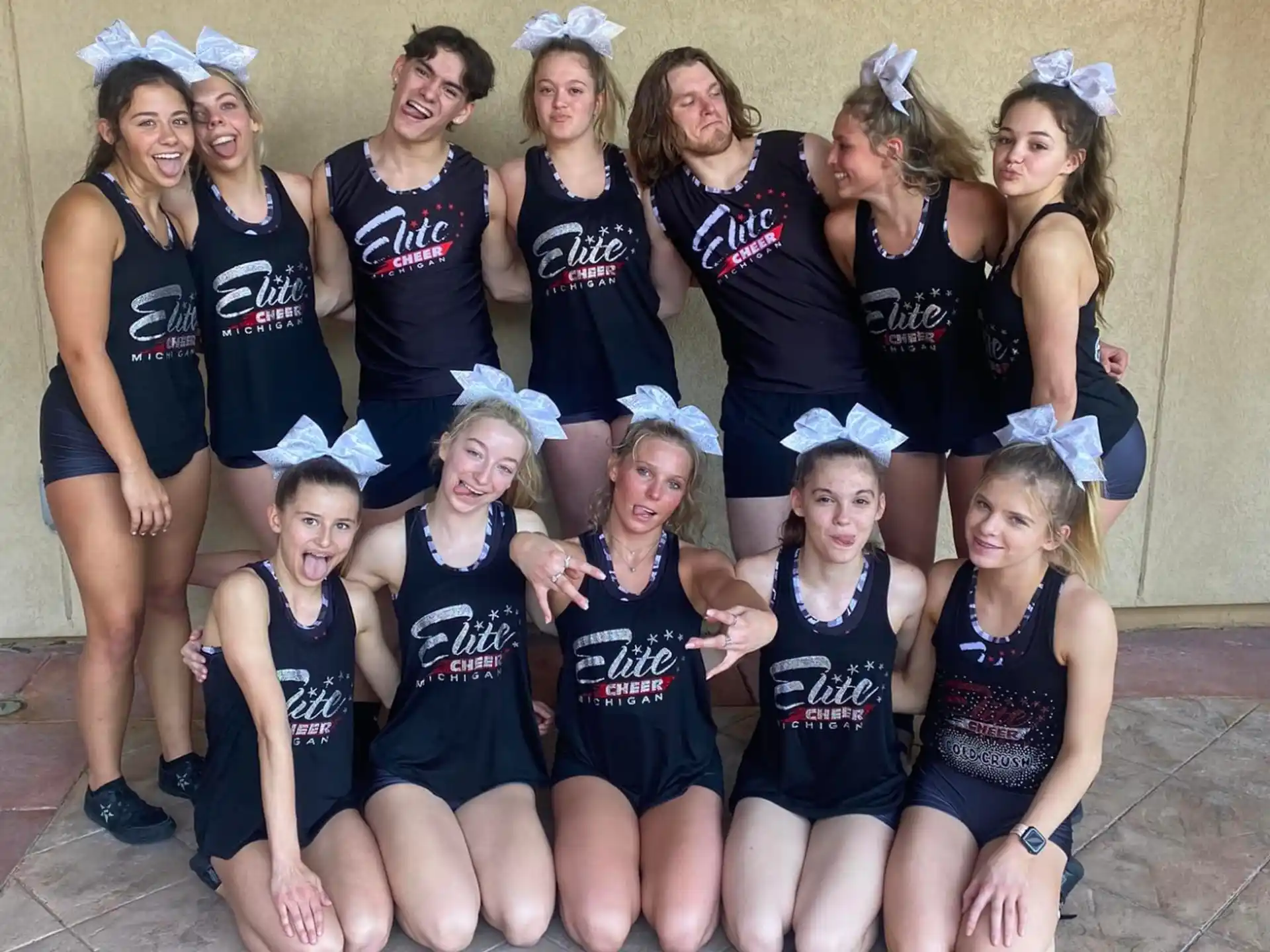 a group of girls in matching outfits