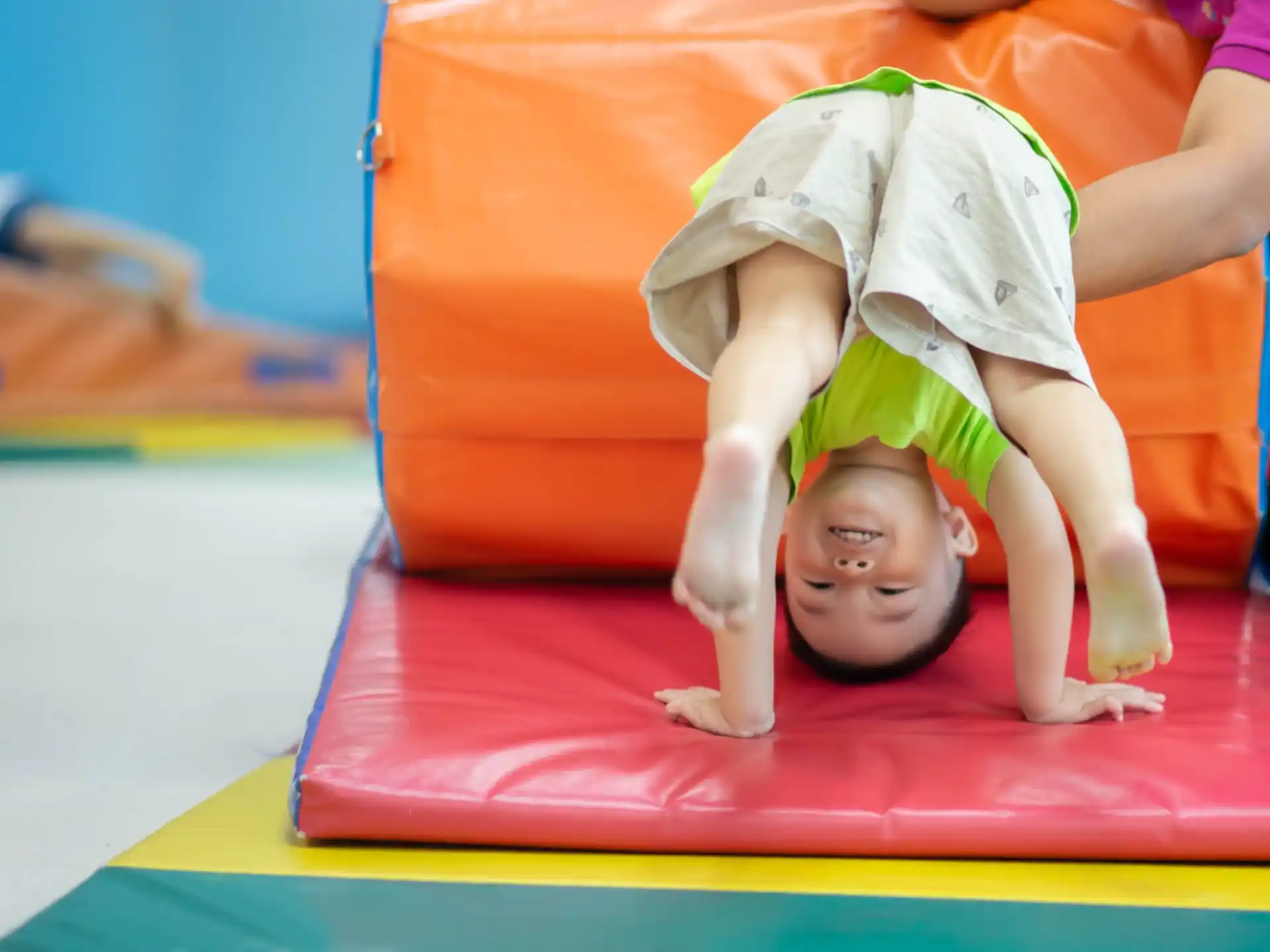 a boy on a mat