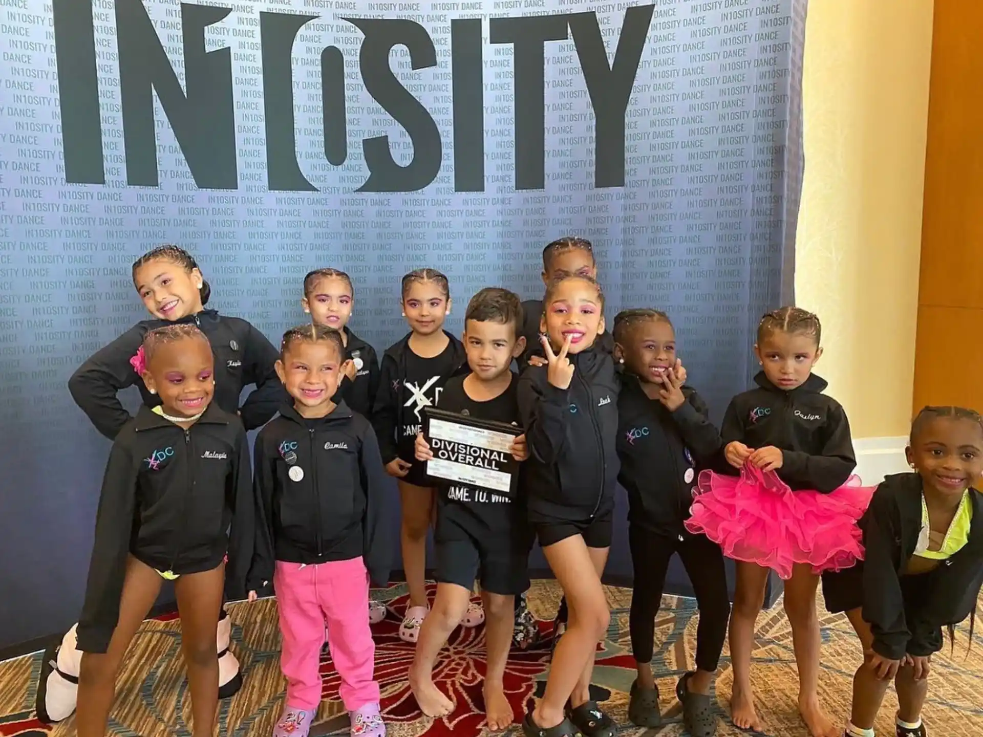 a group of children posing for a photo