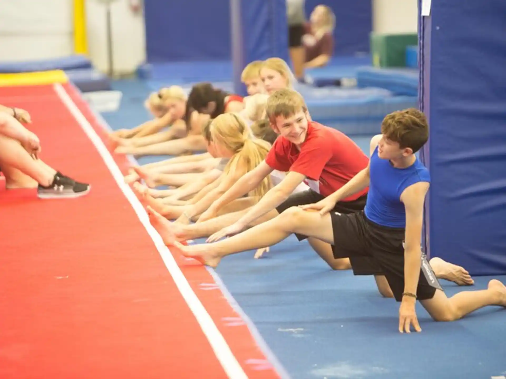 a group of people in a gym