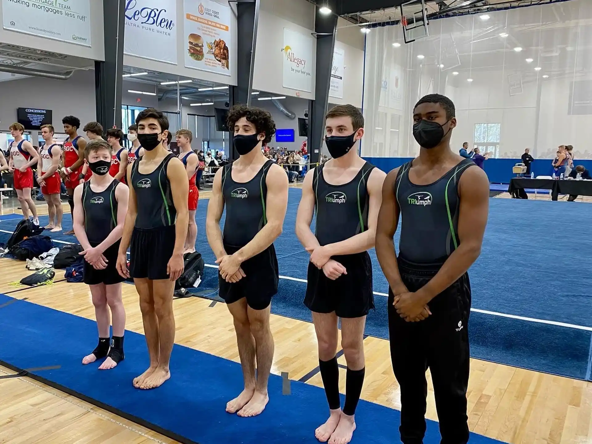 a group of people in a gym