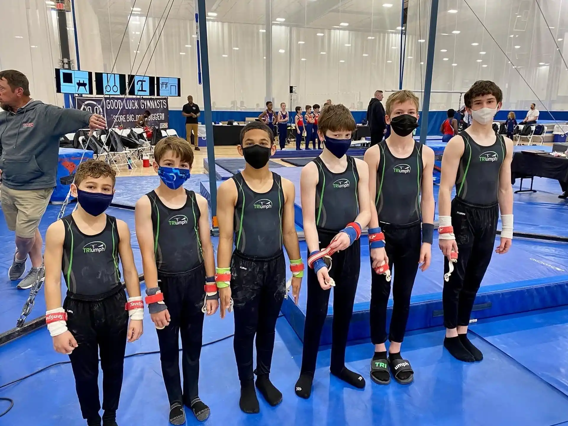a group of people wearing masks