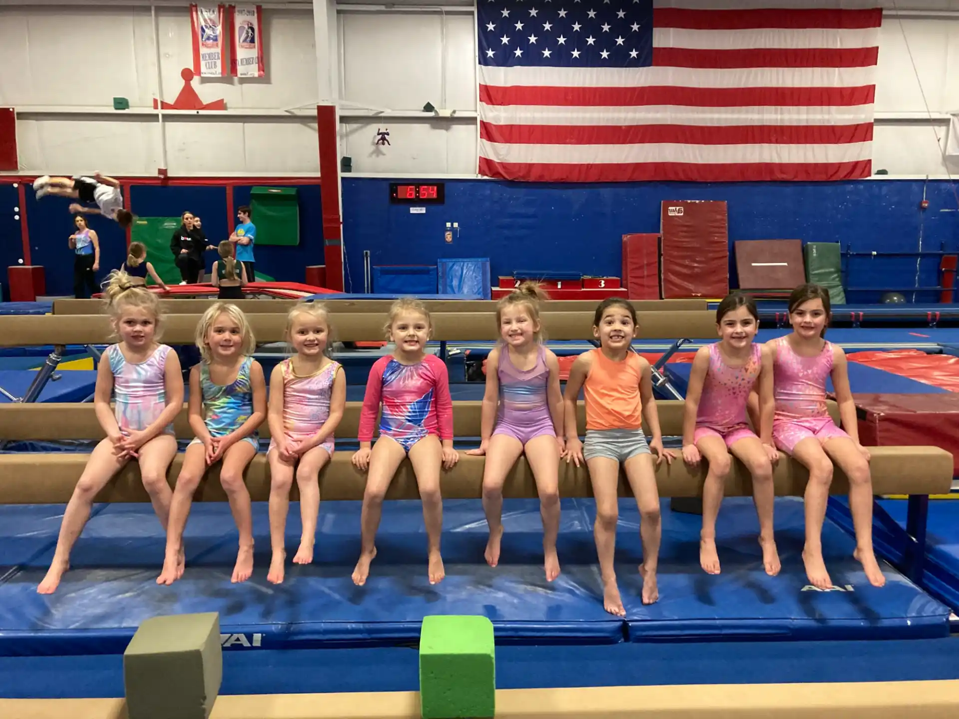 a group of girls in a swimming pool