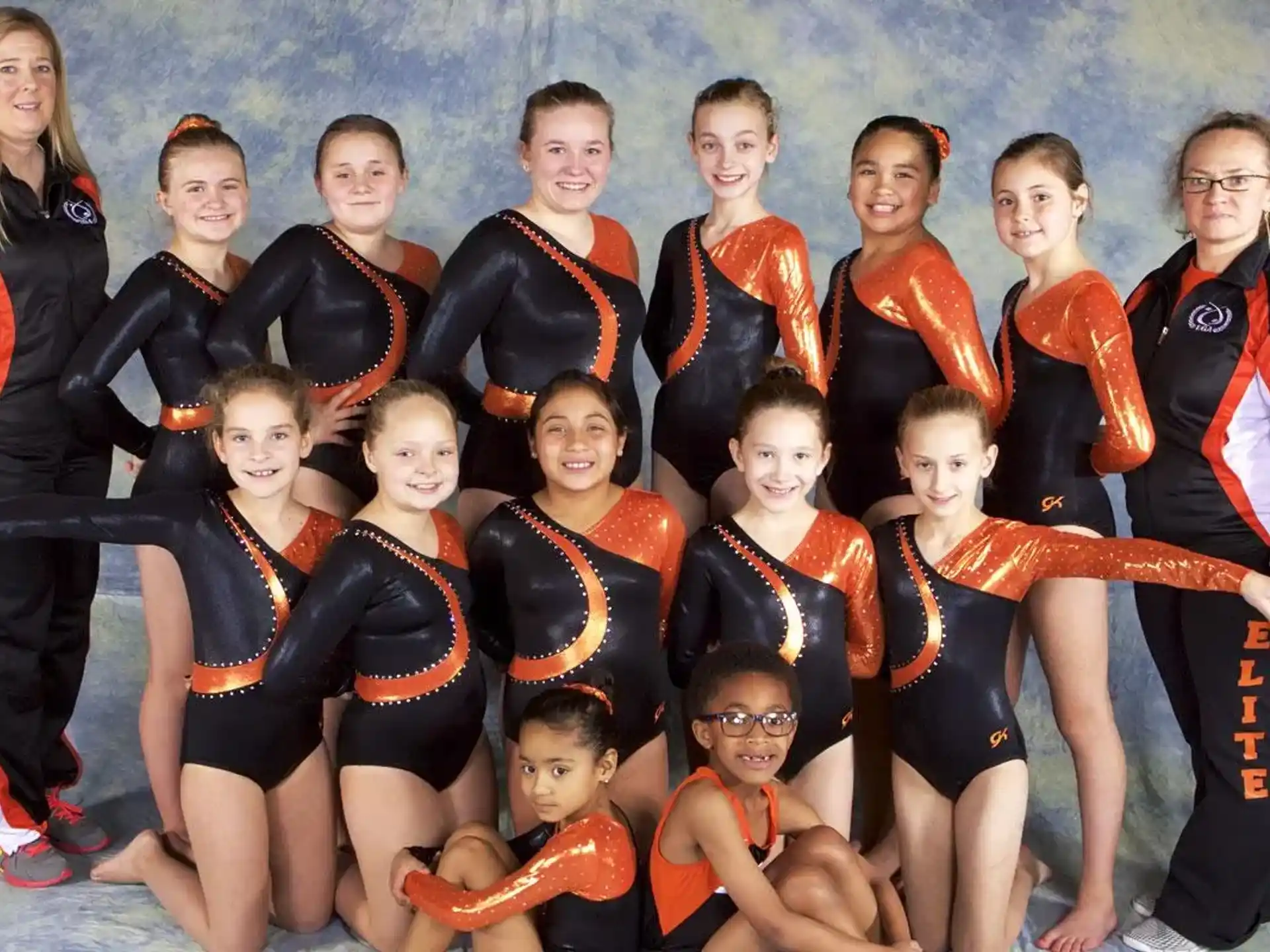 a group of people in athletic wear