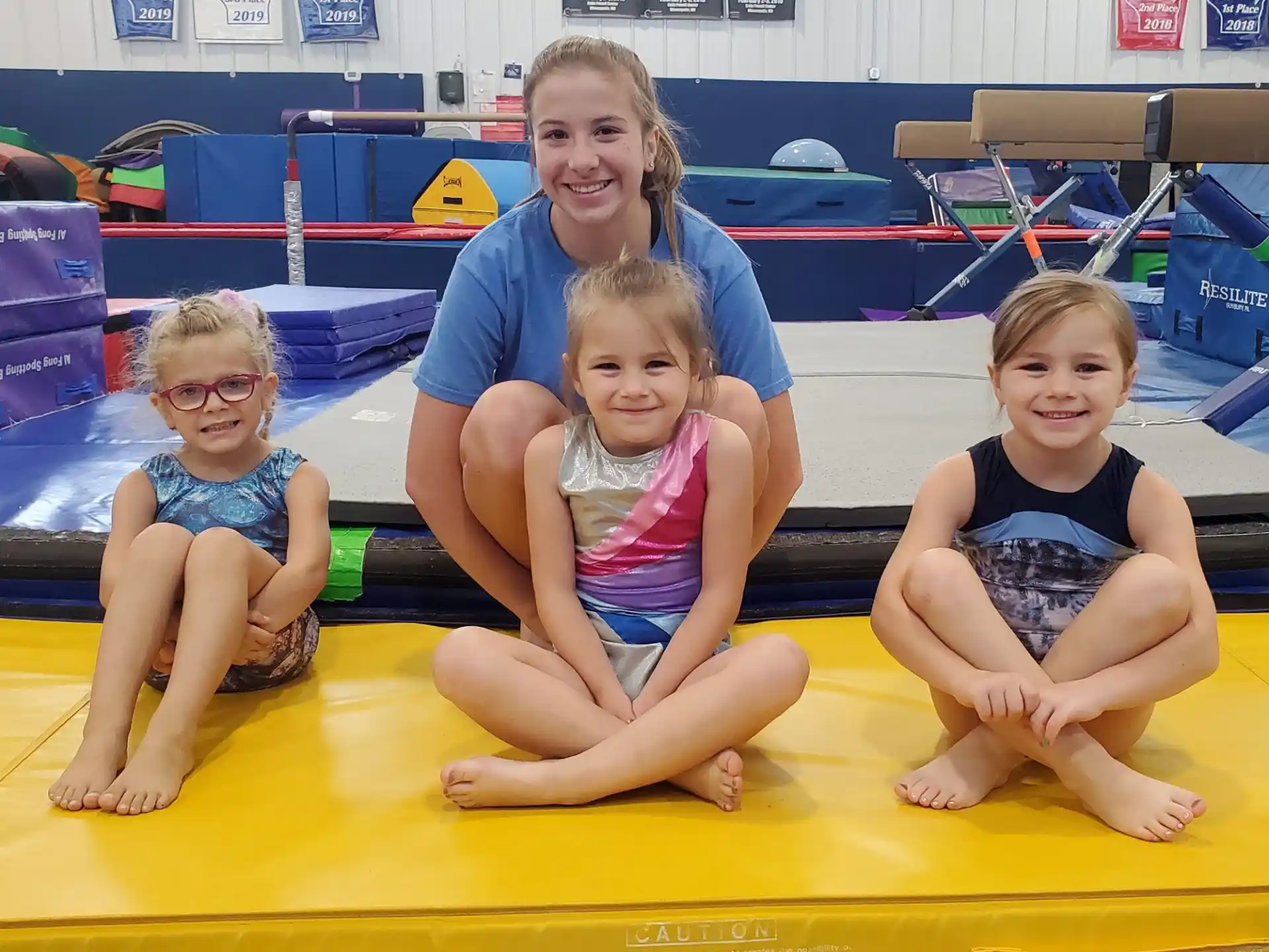 a group of children in a pool