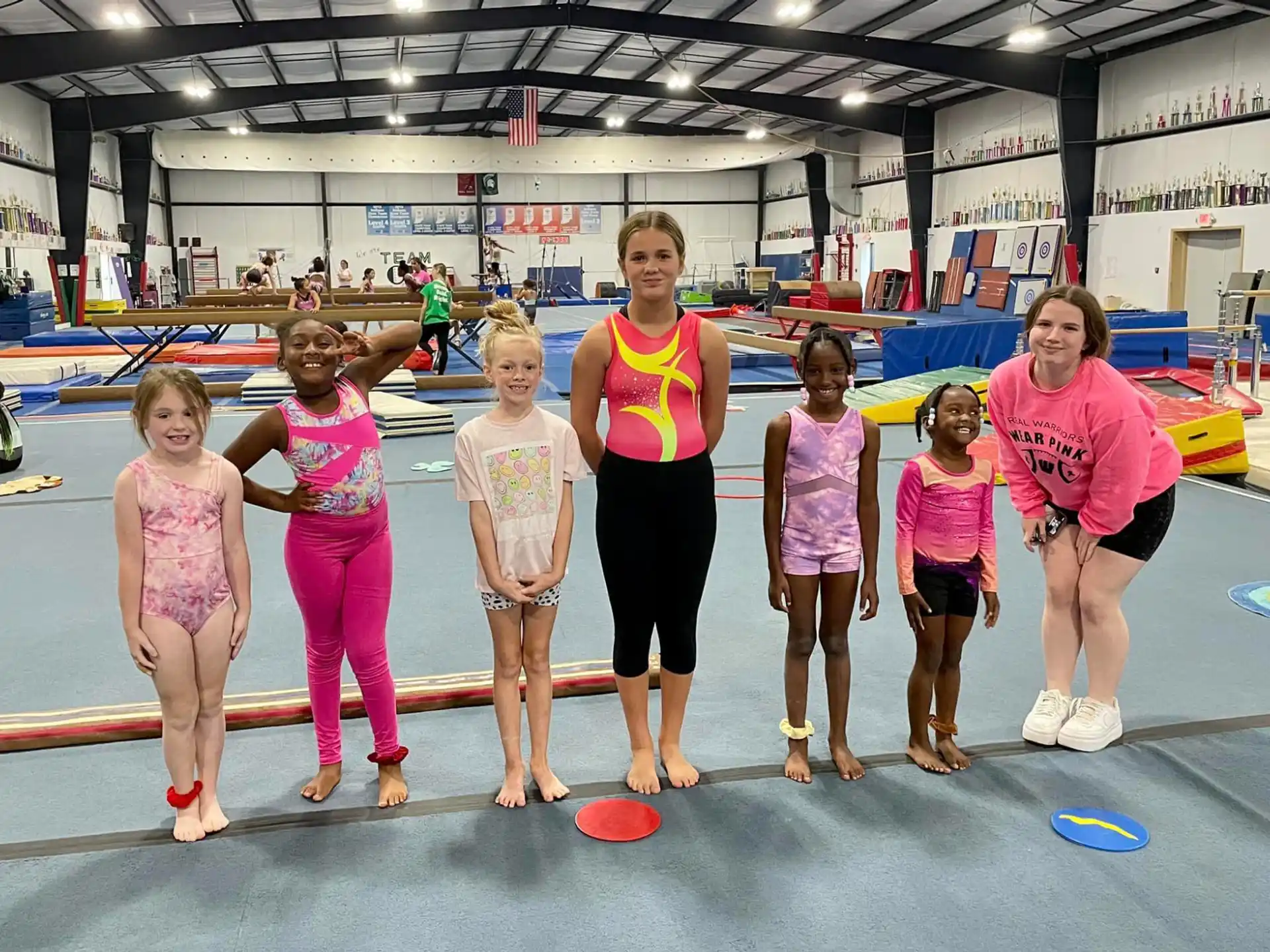 a group of women in a gym