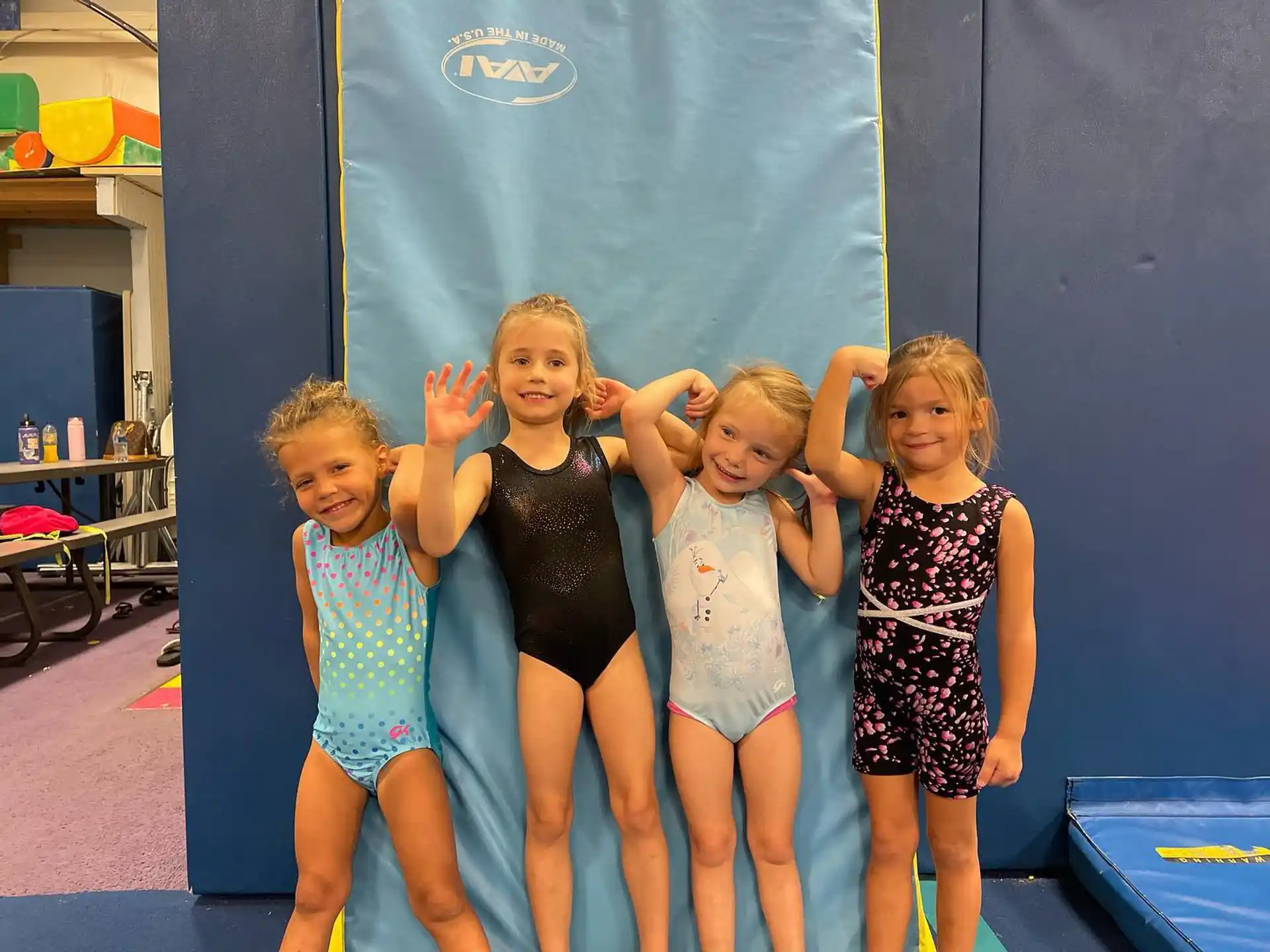 a group of girls posing for a picture
