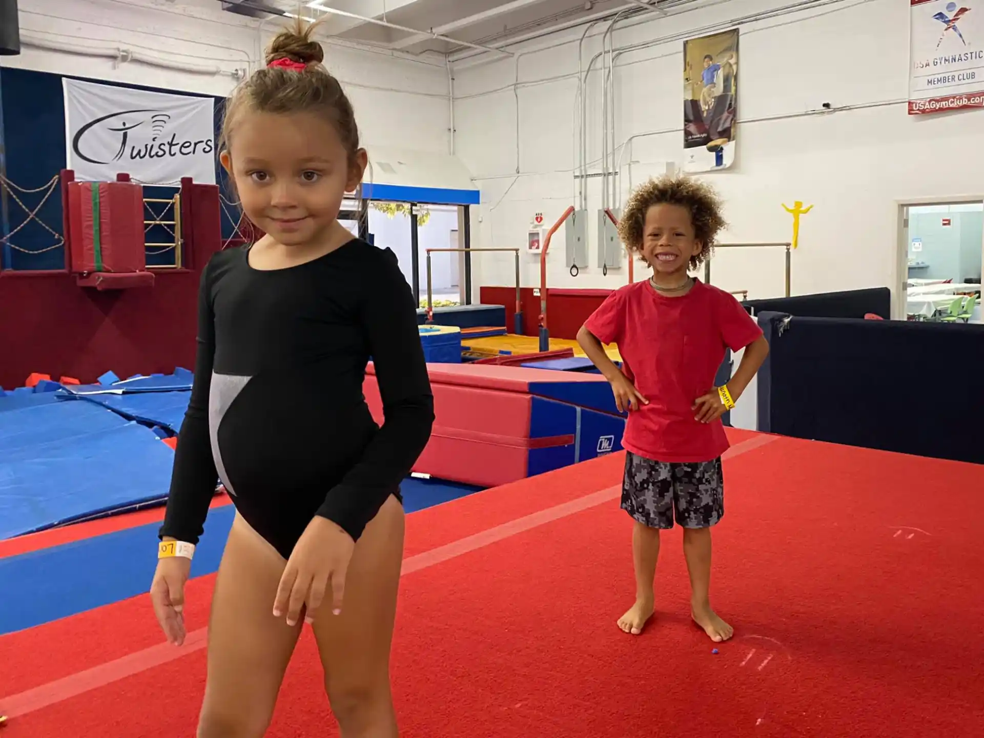 a couple of girls posing for the camera