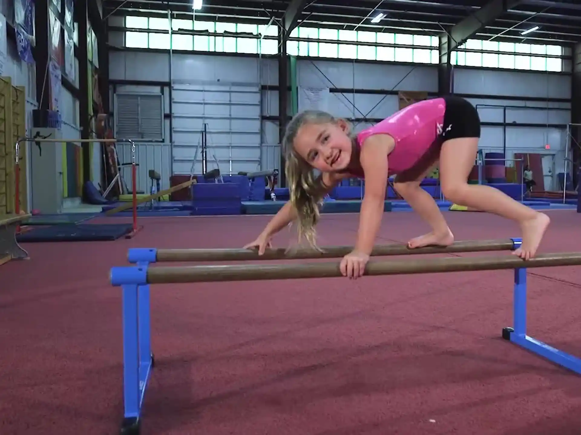 a girl on a bar