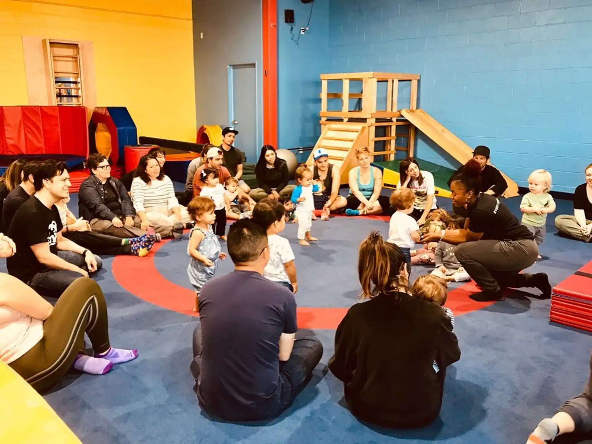 a group of people sitting in a circle
