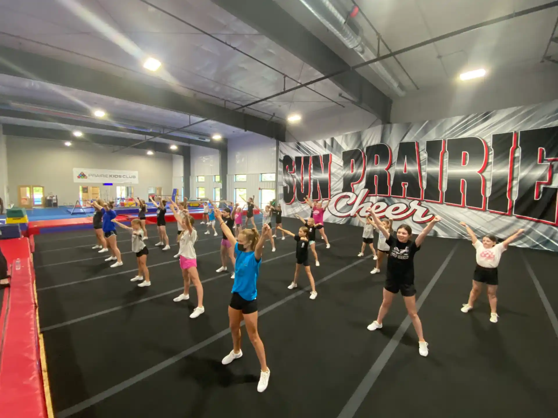a group of women in a gym