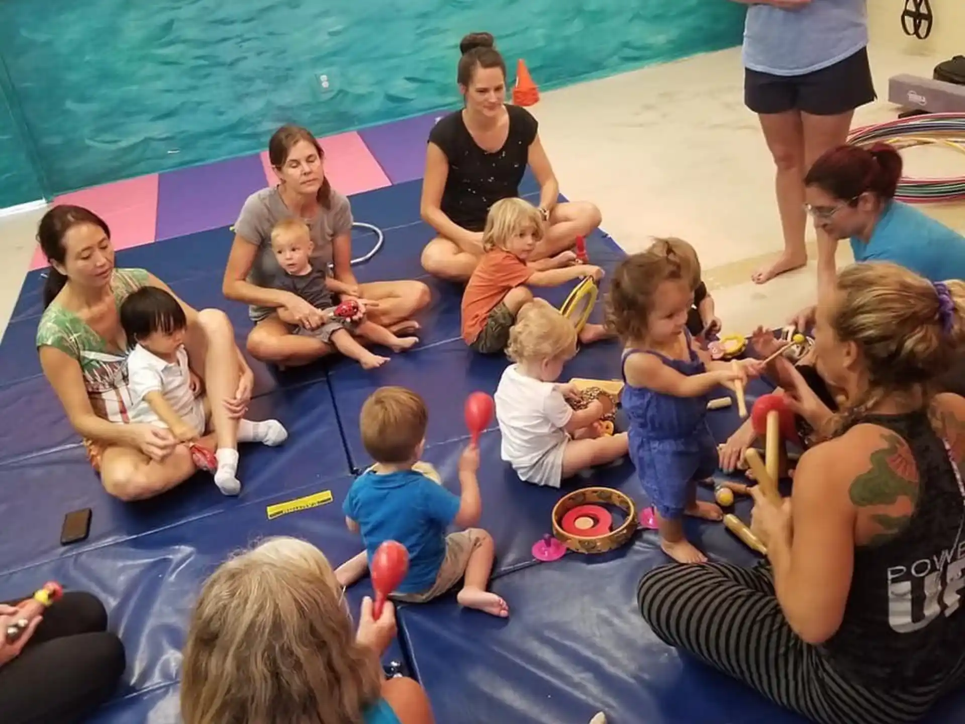 a group of people sitting on the floor