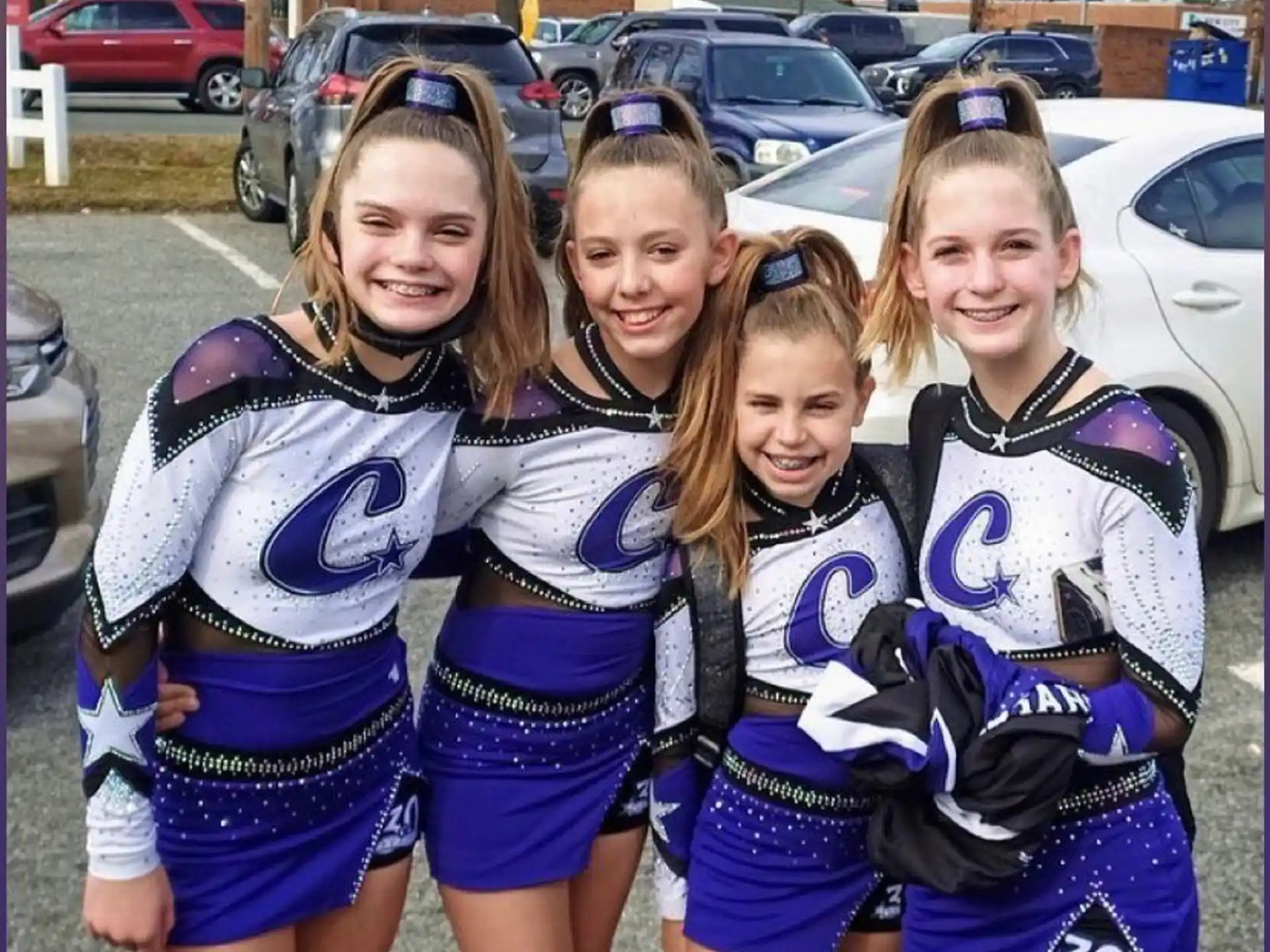 a group of girls in cheerleader uniforms