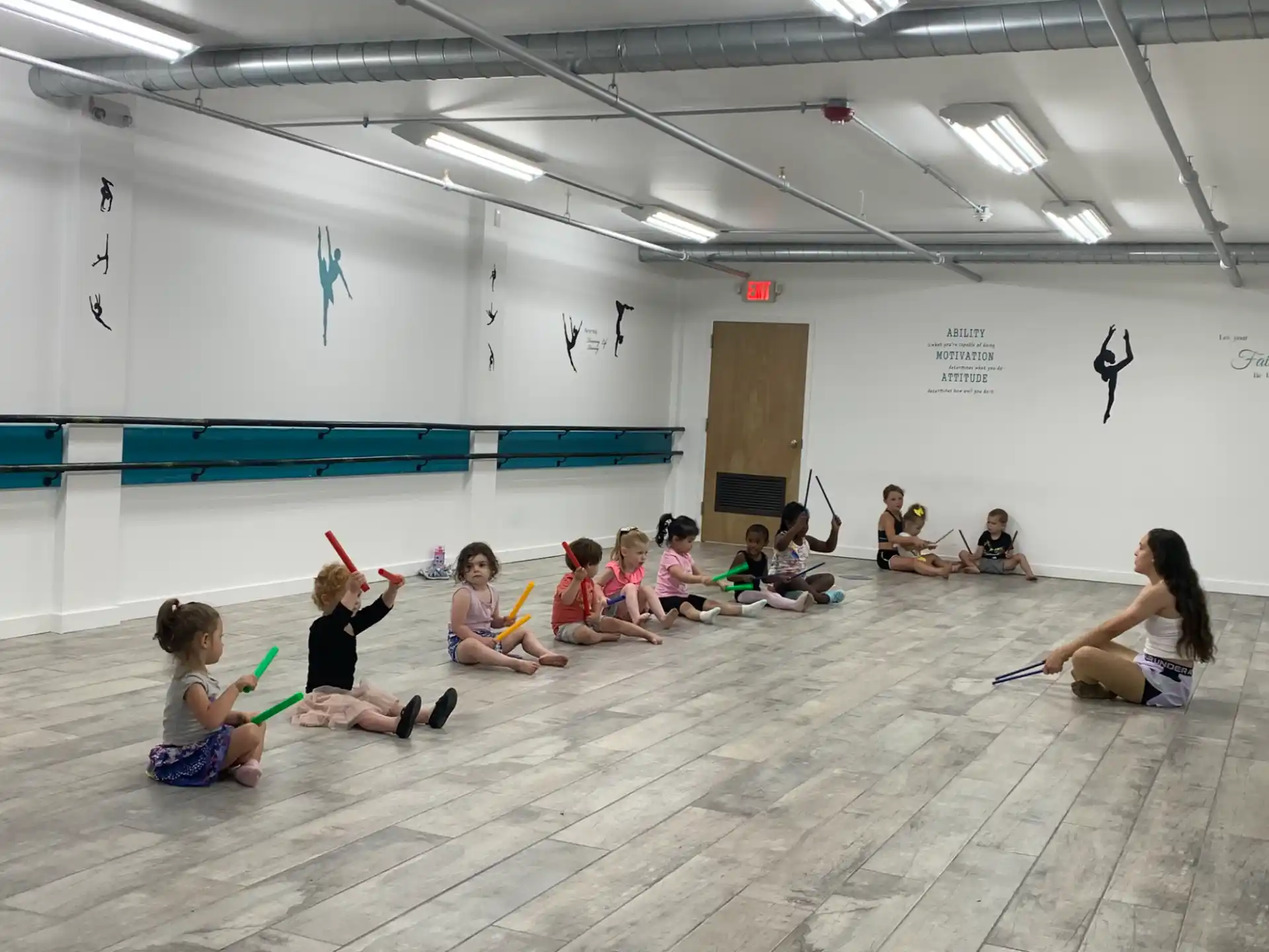 a group of people sitting on the floor