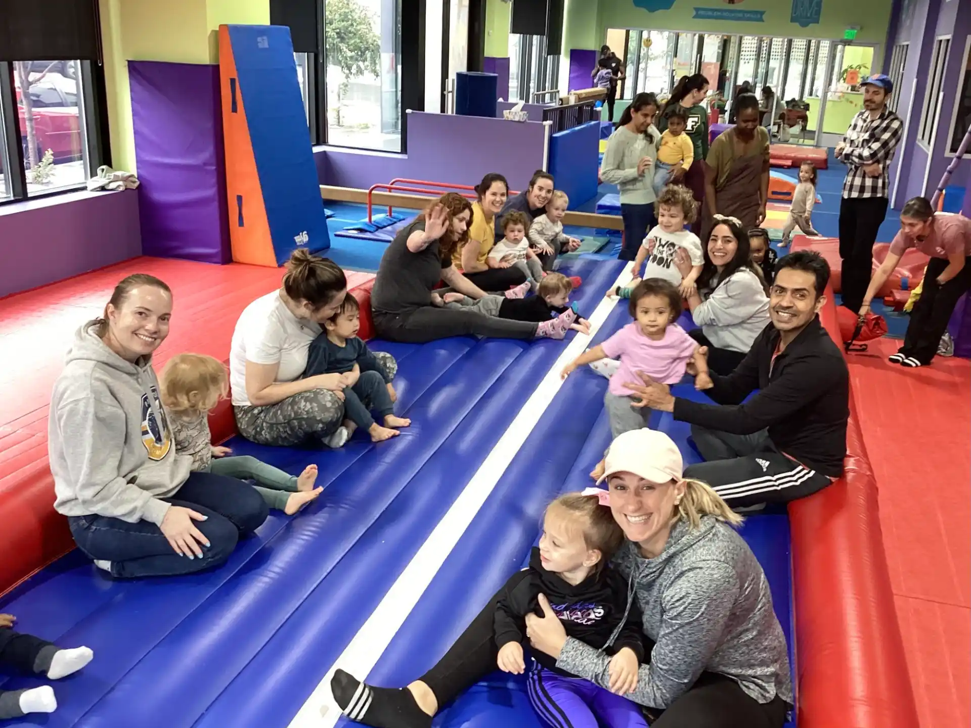 a group of people sitting on the floor