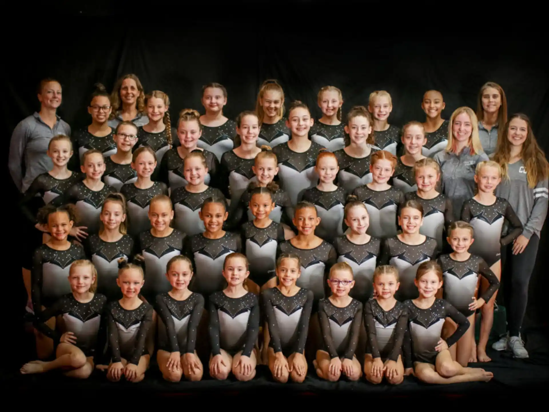 a group of people posing for a photo