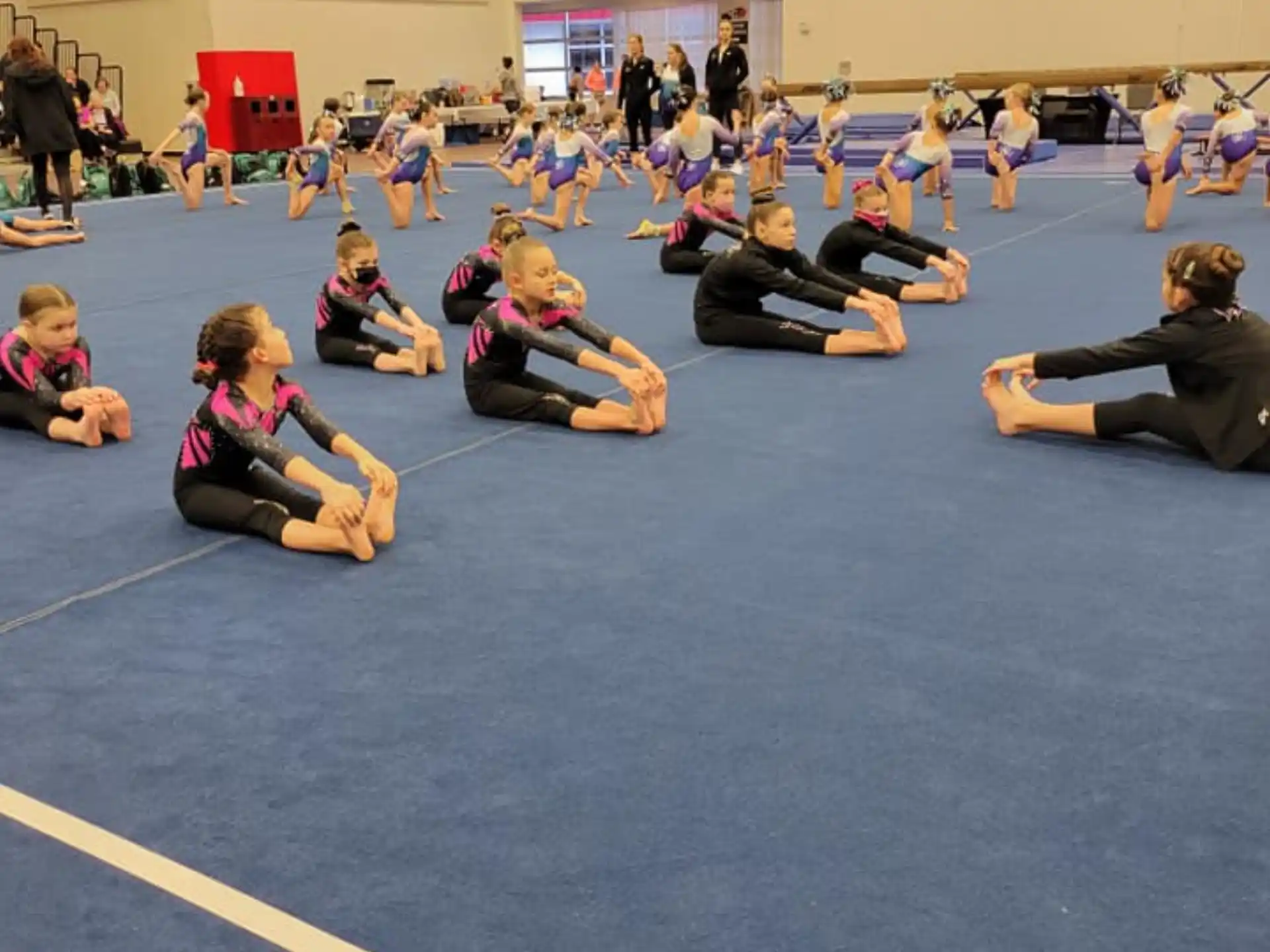 a group of people sitting on the floor