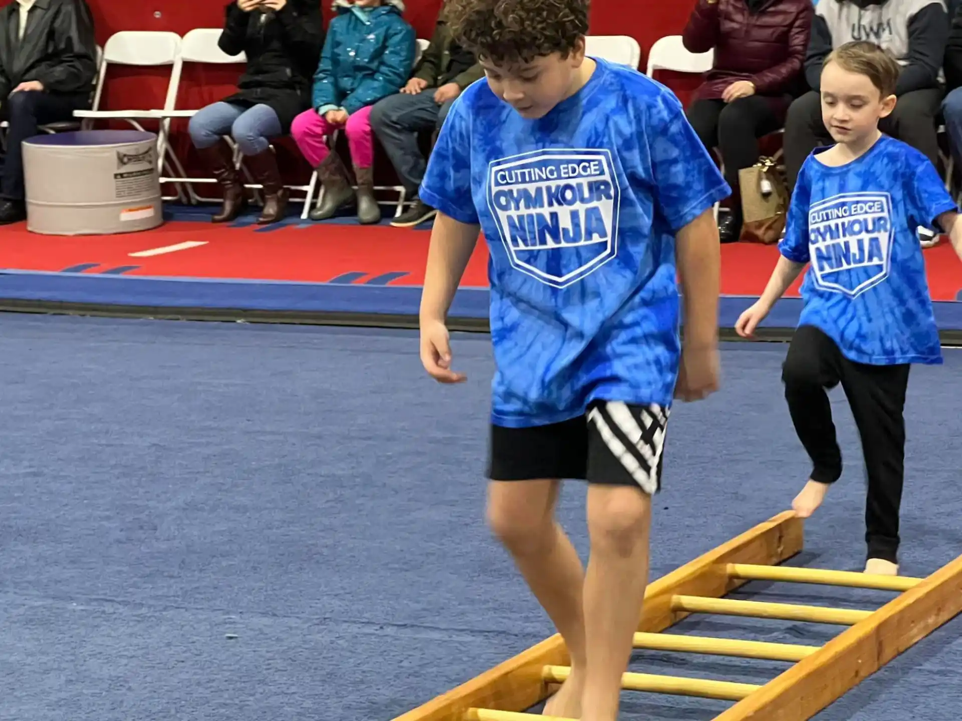 a boy running on a track