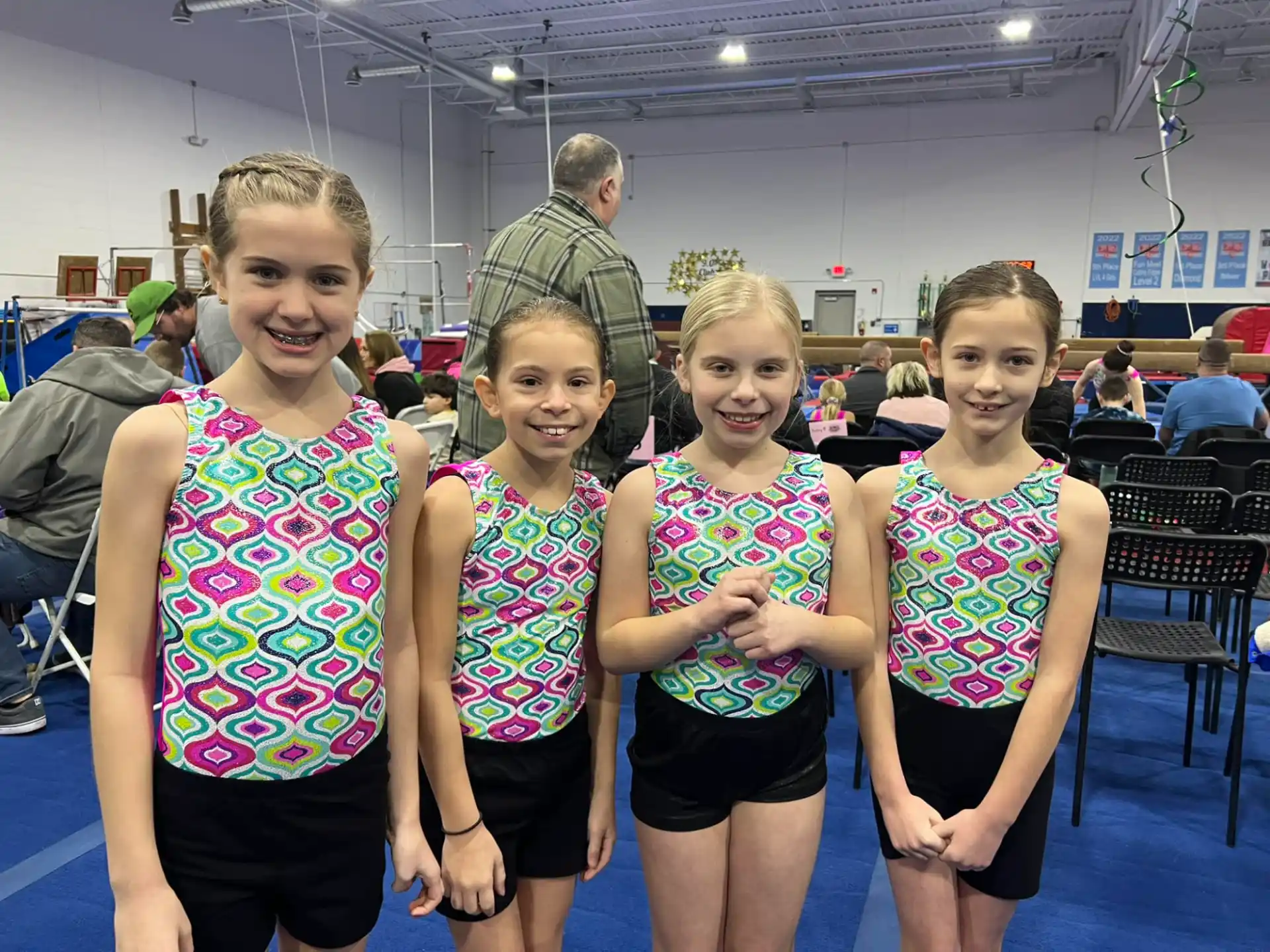 a group of girls posing for a picture