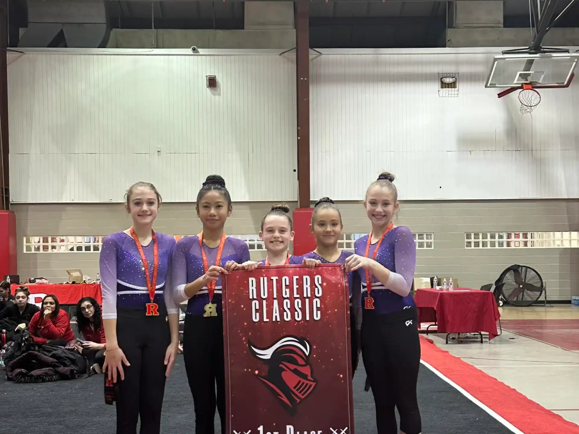 a group of people holding a sign