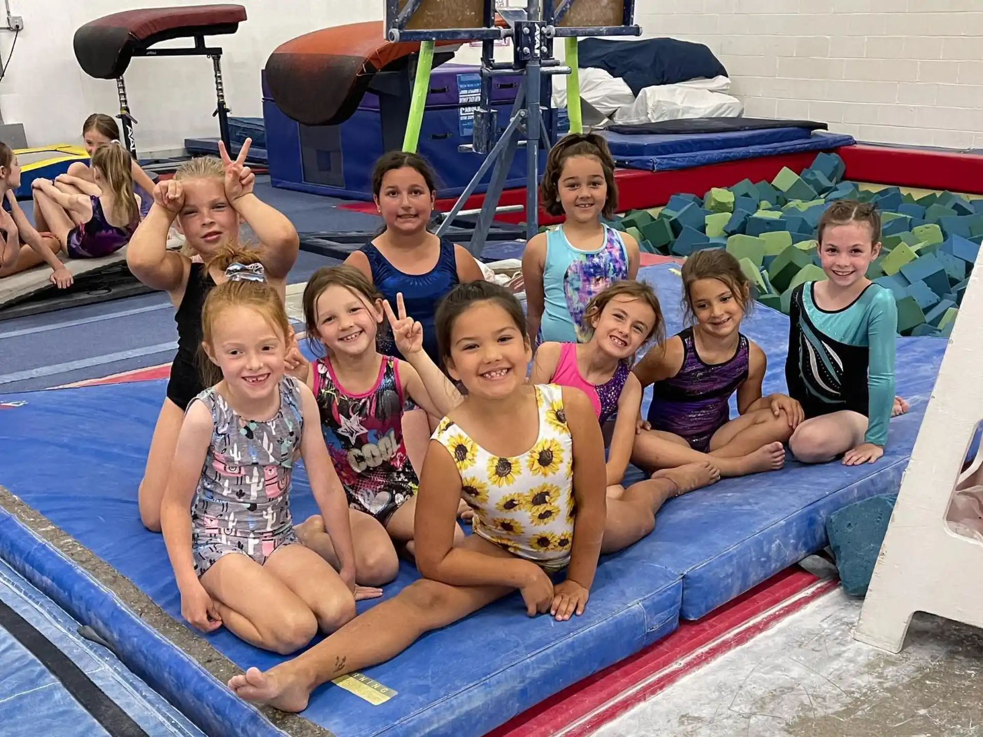 a group of children in a pool