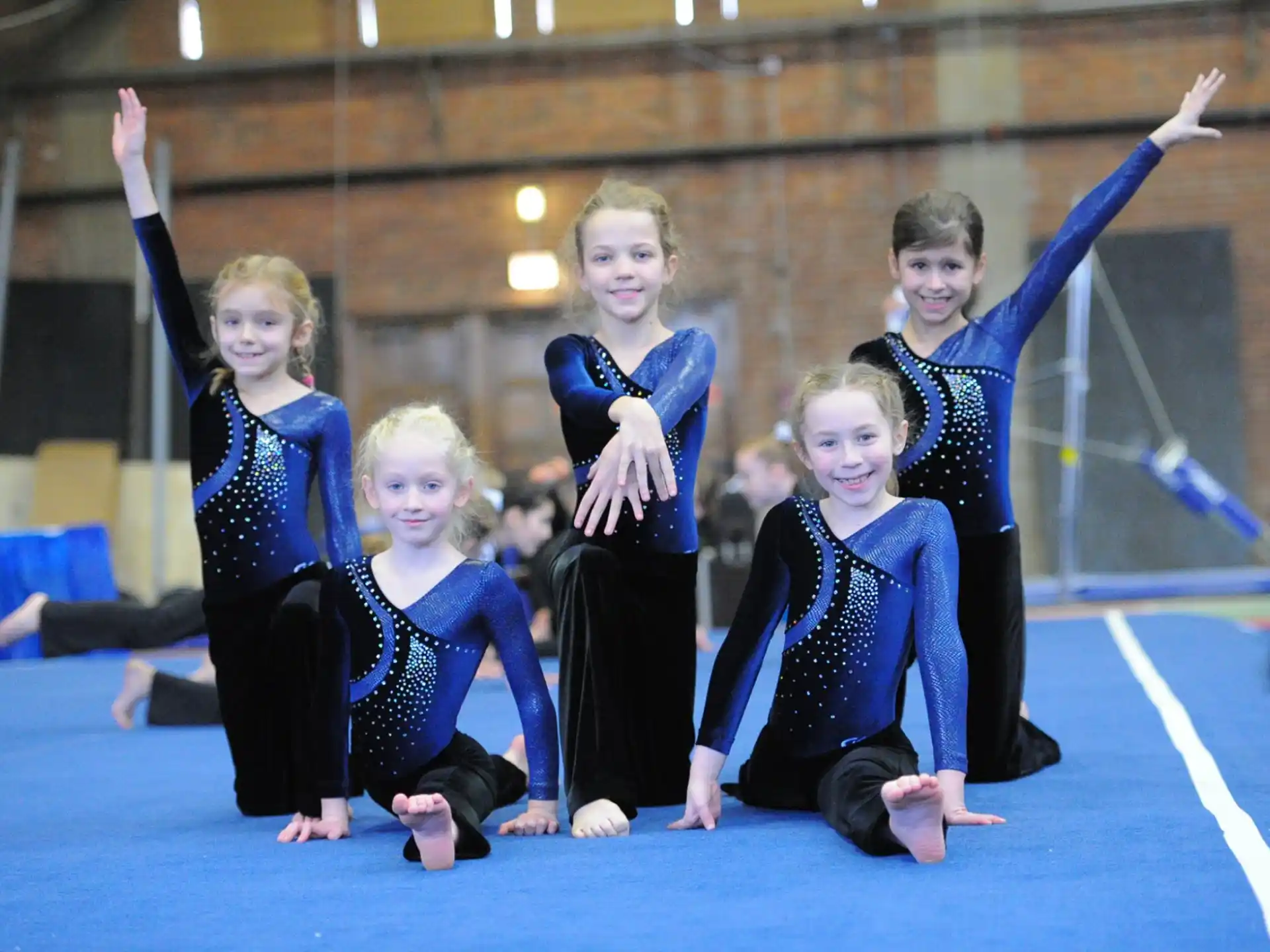 a group of girls in a gym