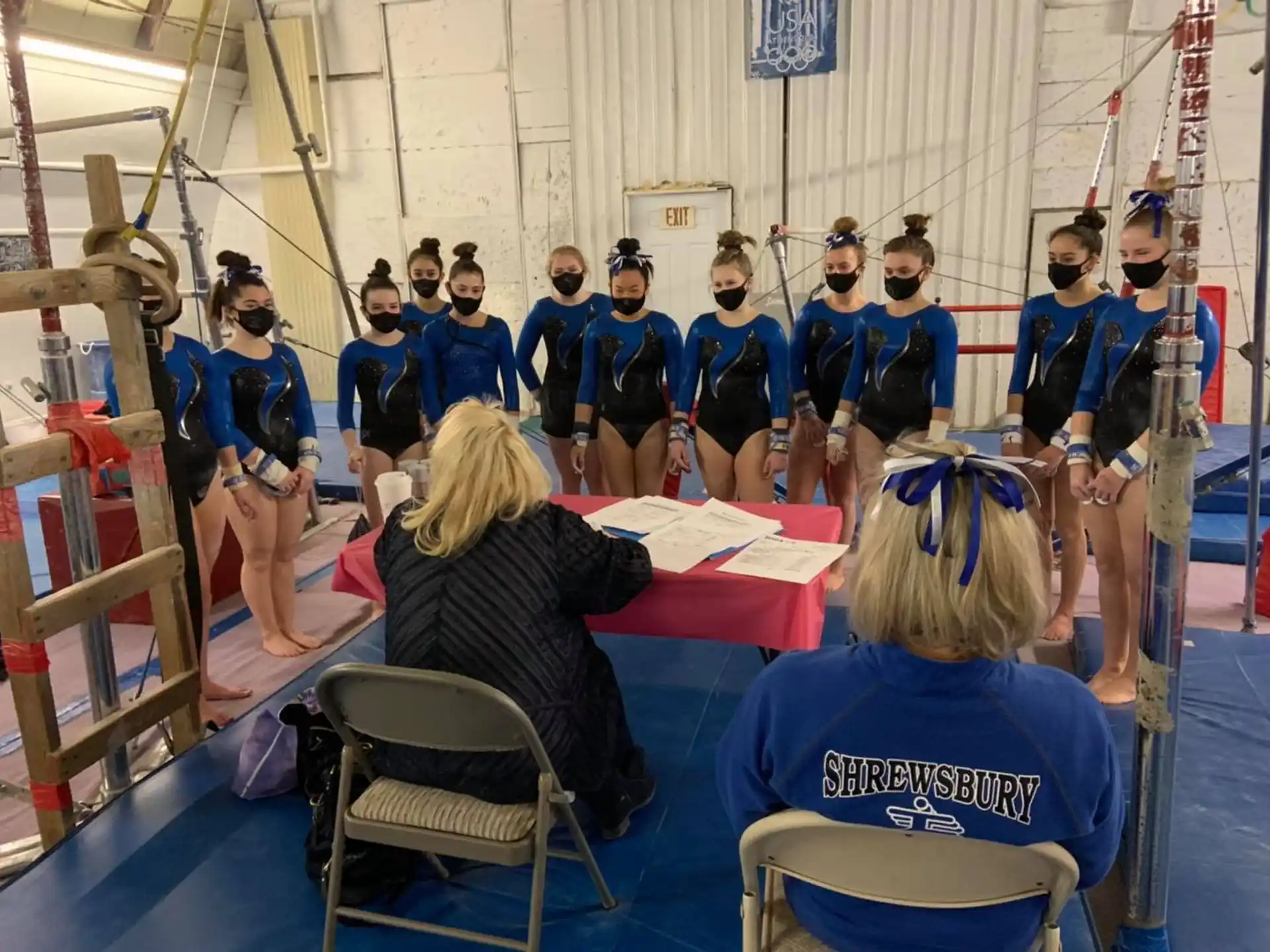 a group of people in blue uniforms