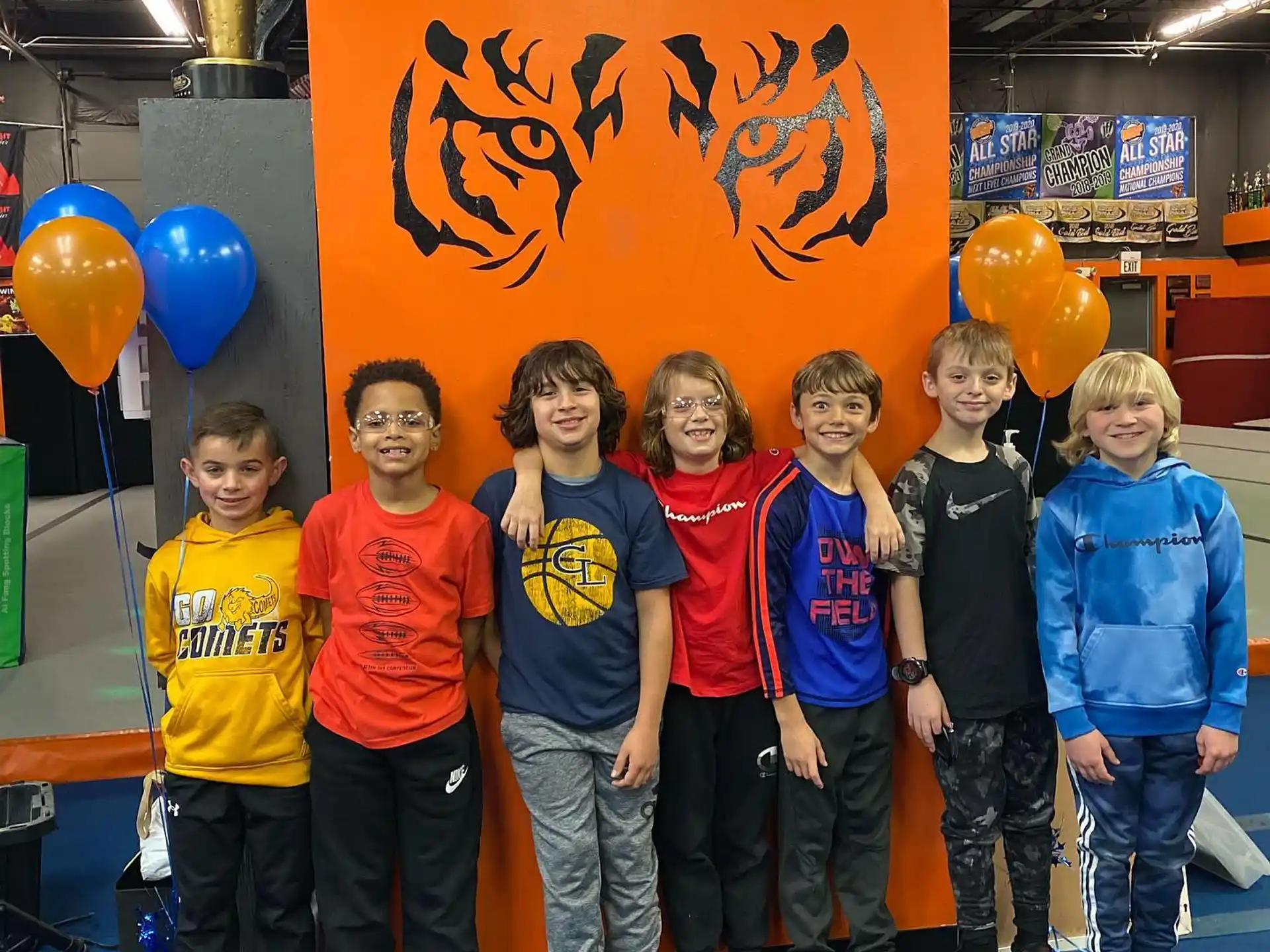 a group of children posing for a photo