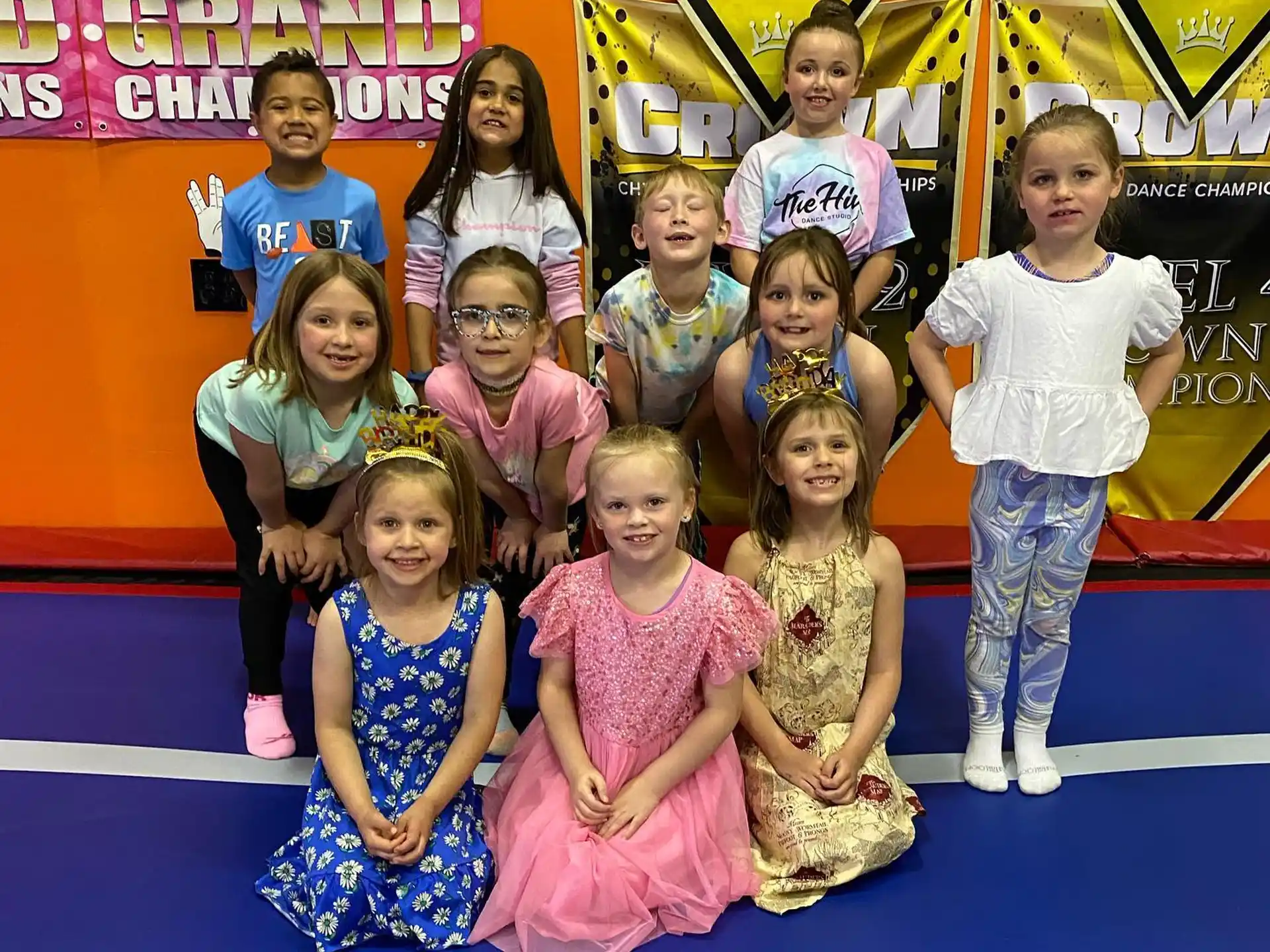 a group of children posing for a photo