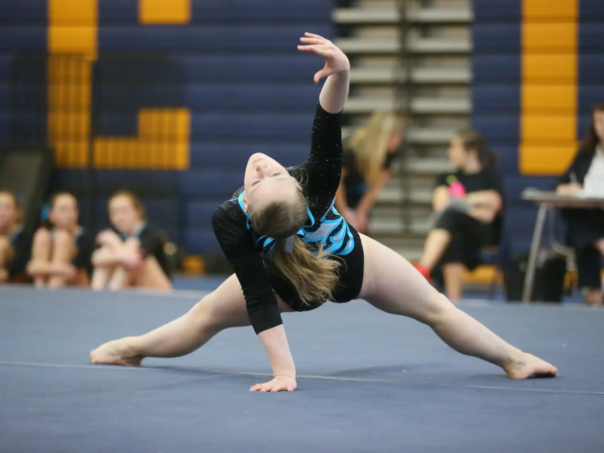 a person doing a gymnastics move
