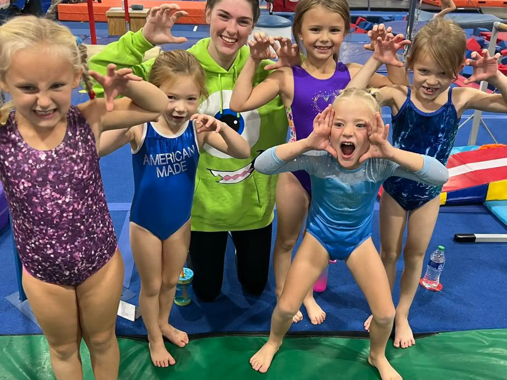a group of children in a pool