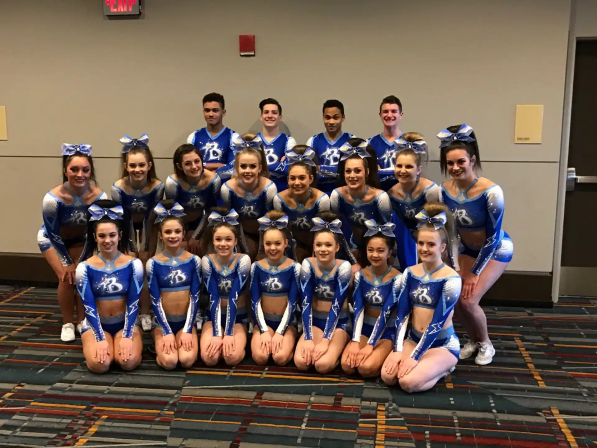 a group of people wearing blue uniforms