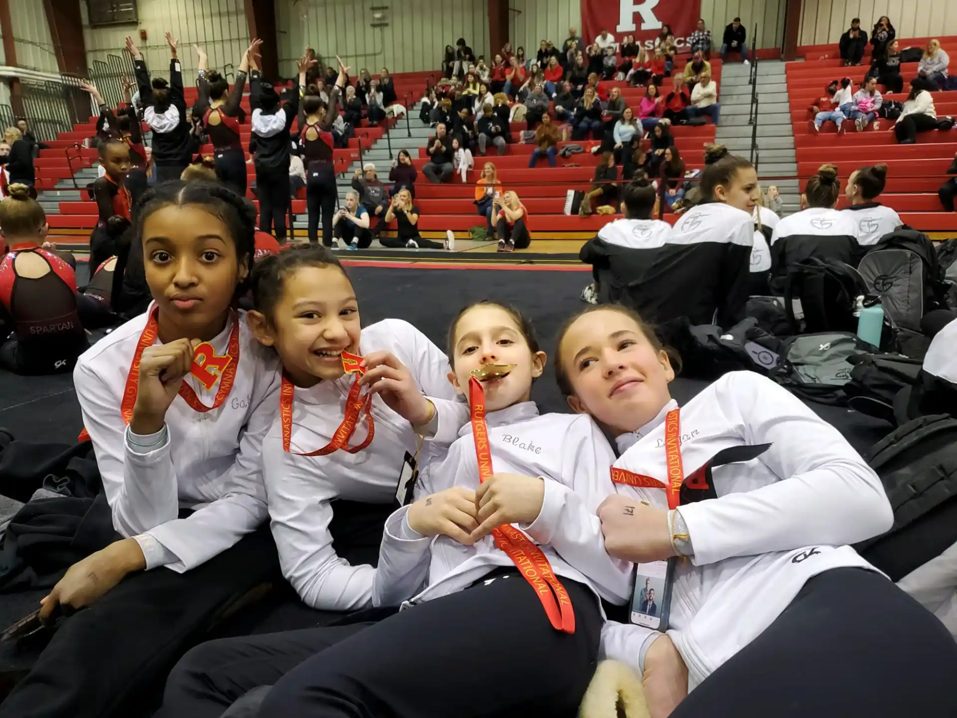 a group of women in karate uniforms