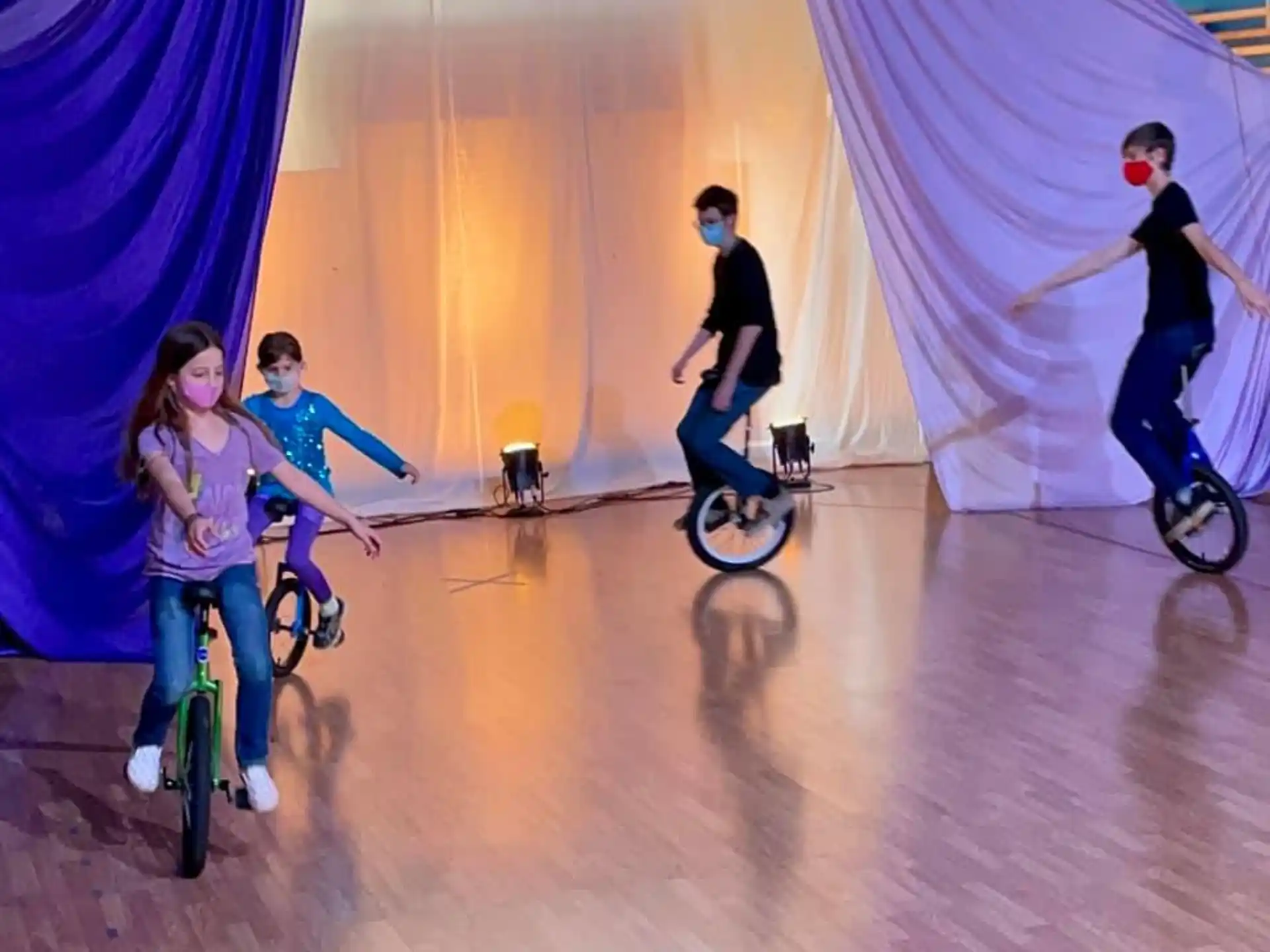 a group of people riding bikes