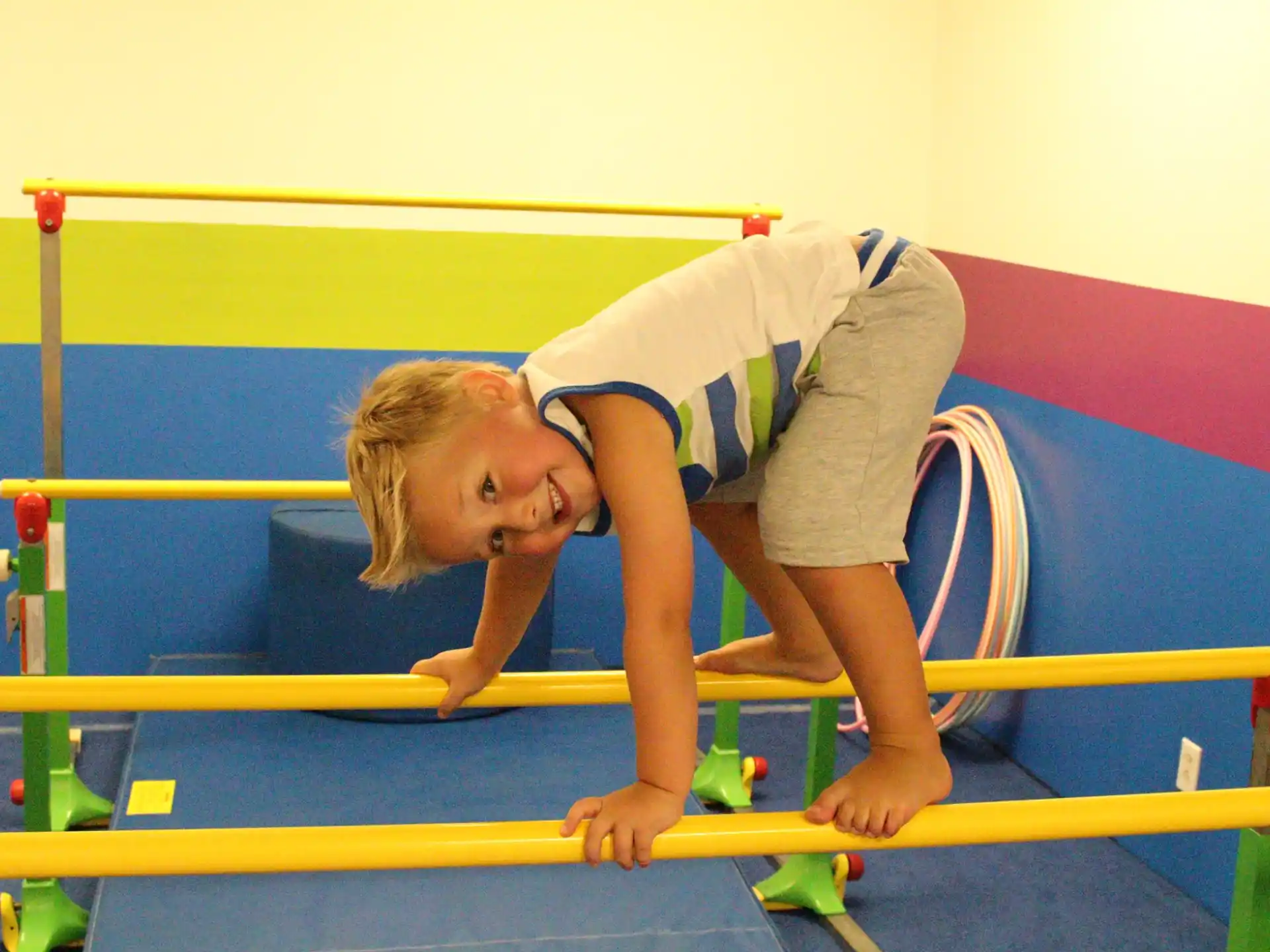 a boy playing on a playground