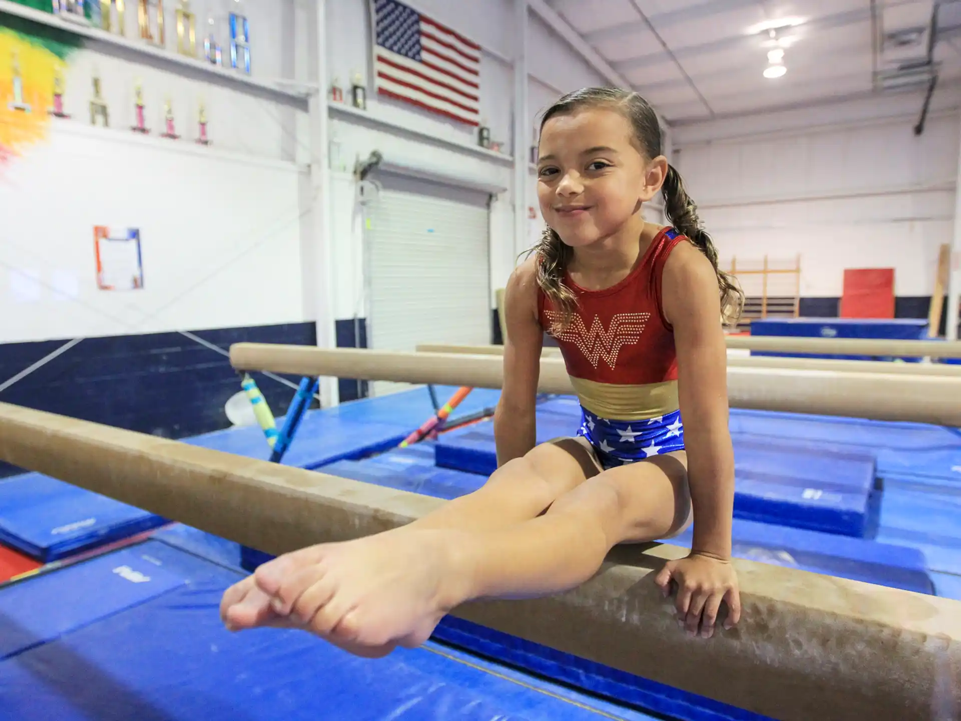 a young girl in a gym