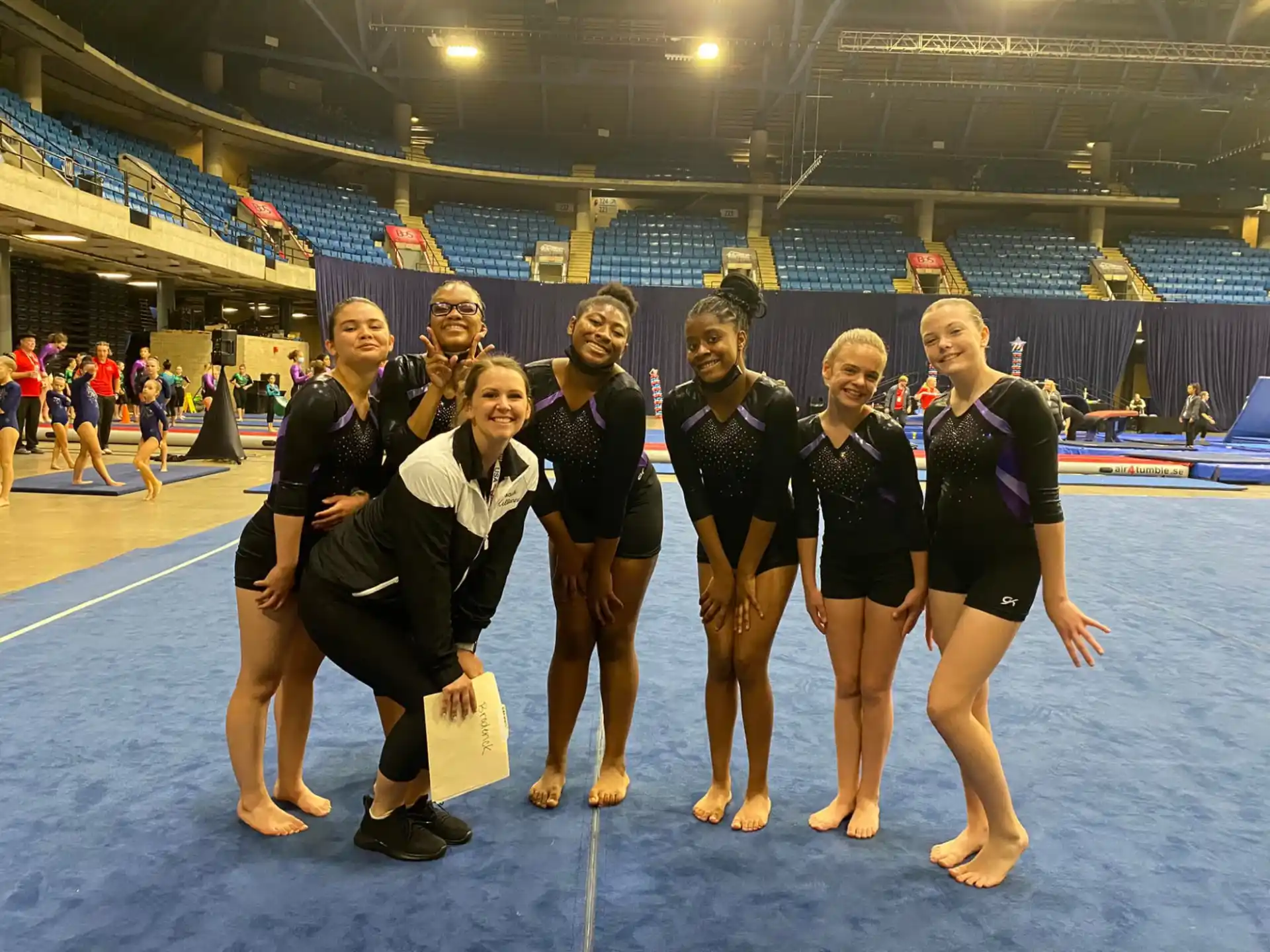 a group of women in a gym