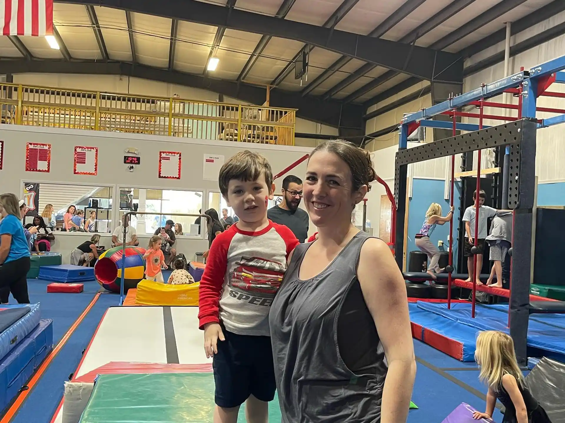 a person and a boy posing for a picture