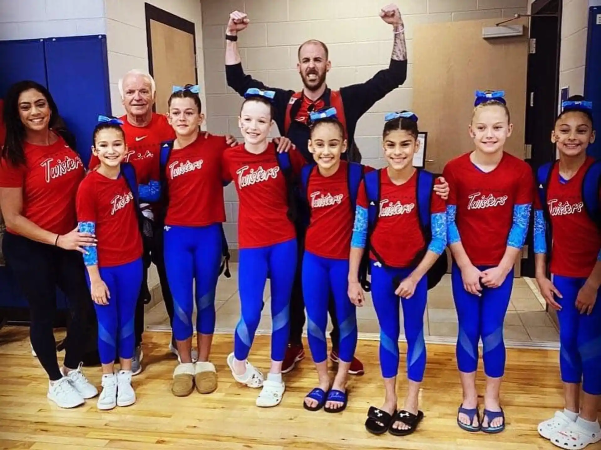 a group of people wearing matching uniforms