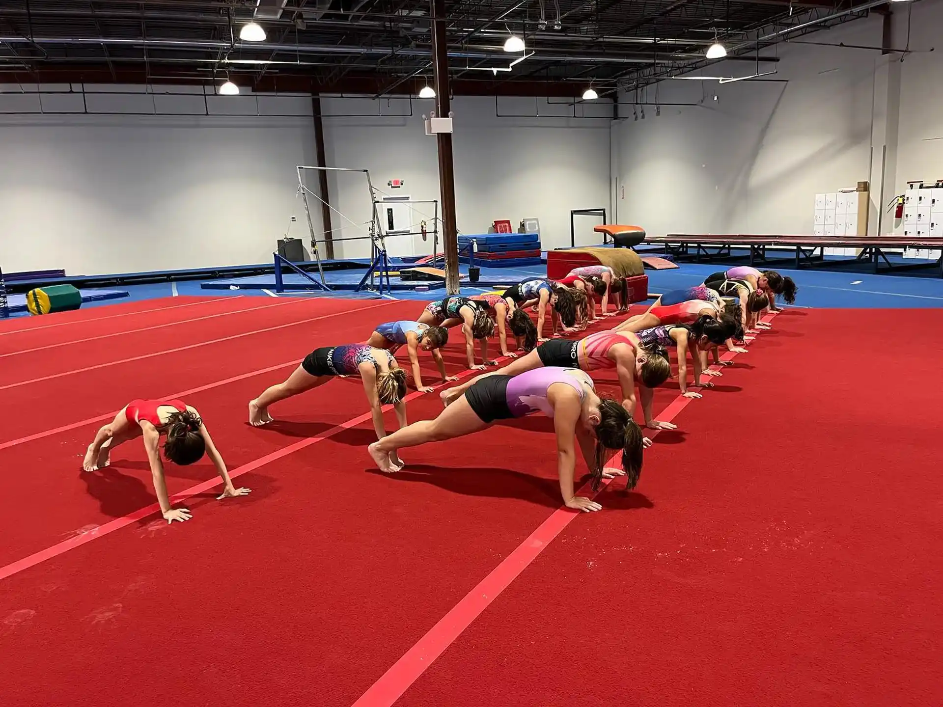 a group of people in a gym
