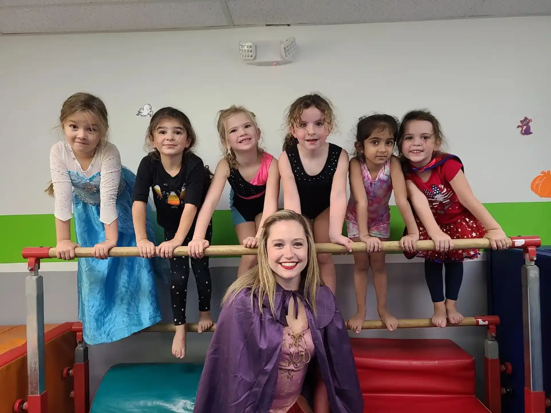 a group of girls posing for a photo