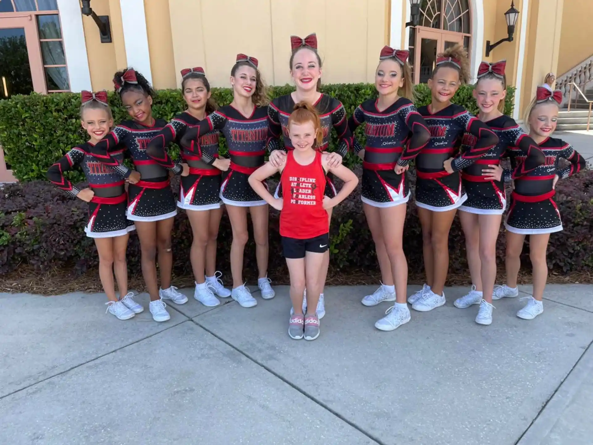 a group of girls in matching uniforms