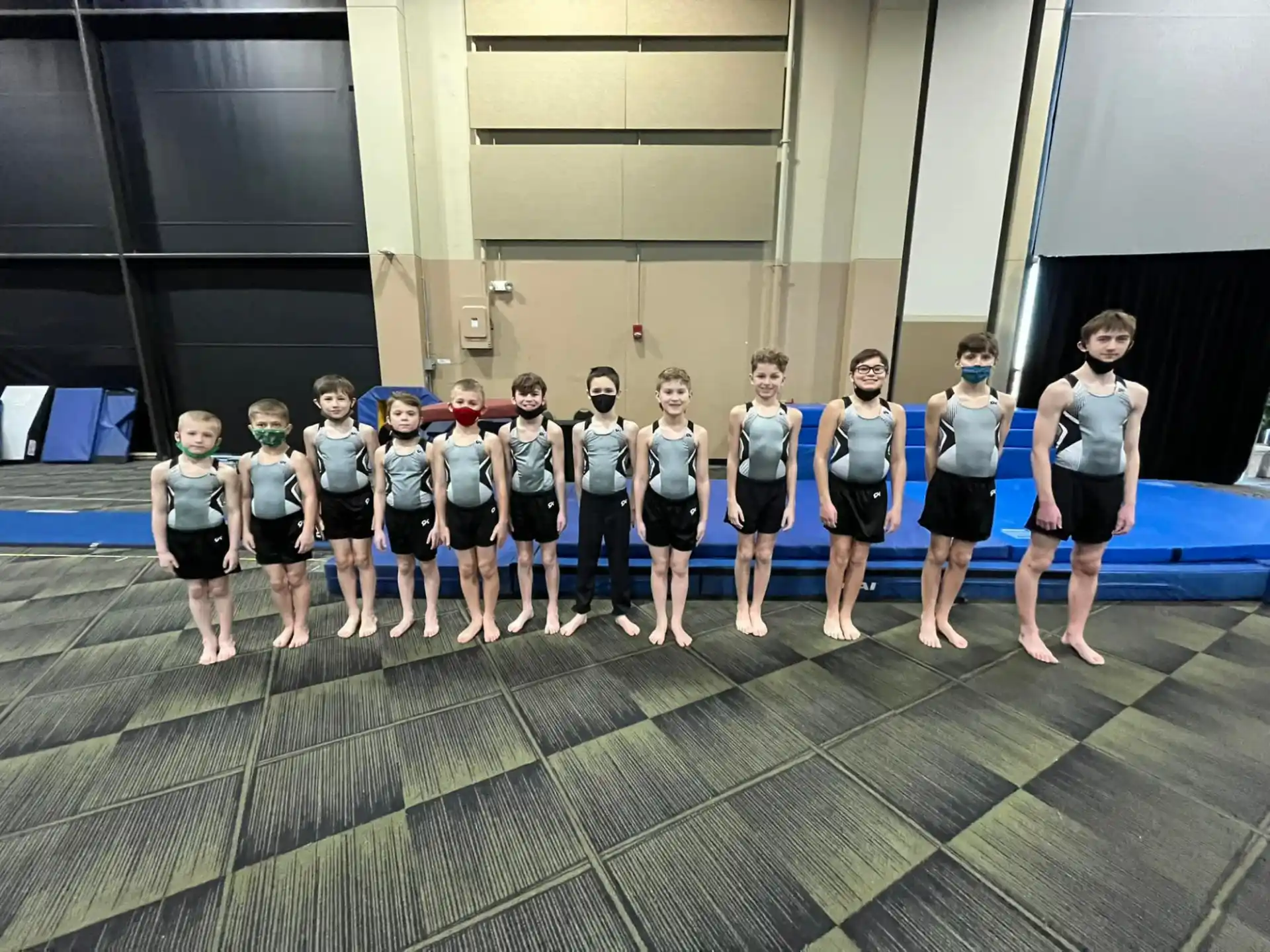 a group of people wearing matching outfits
