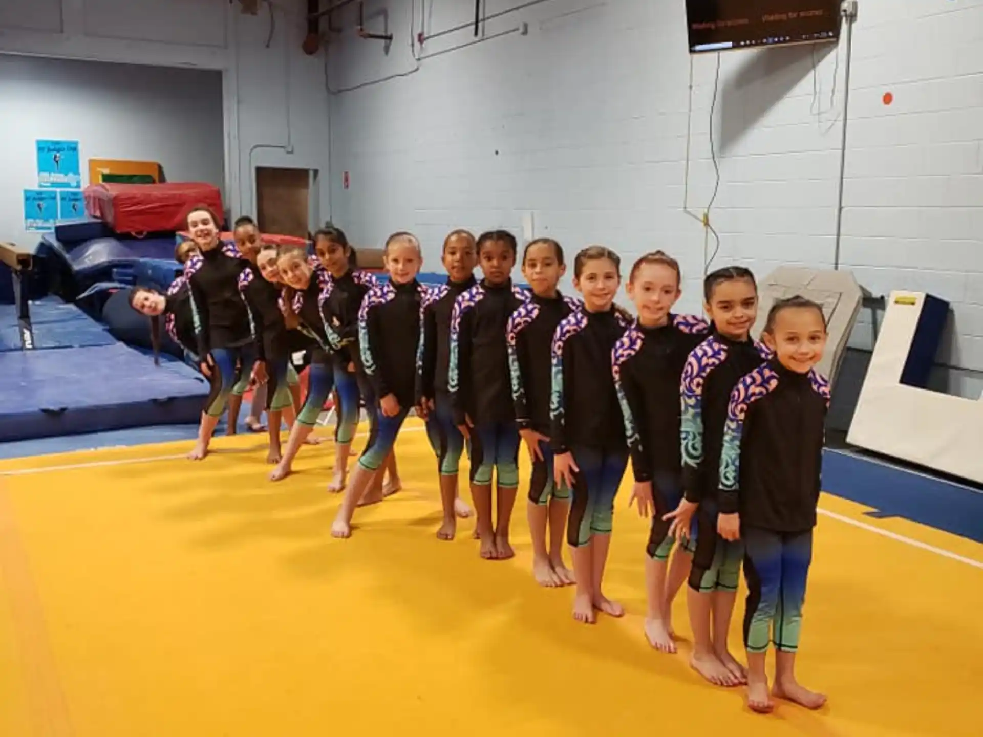 a group of children posing for a photo