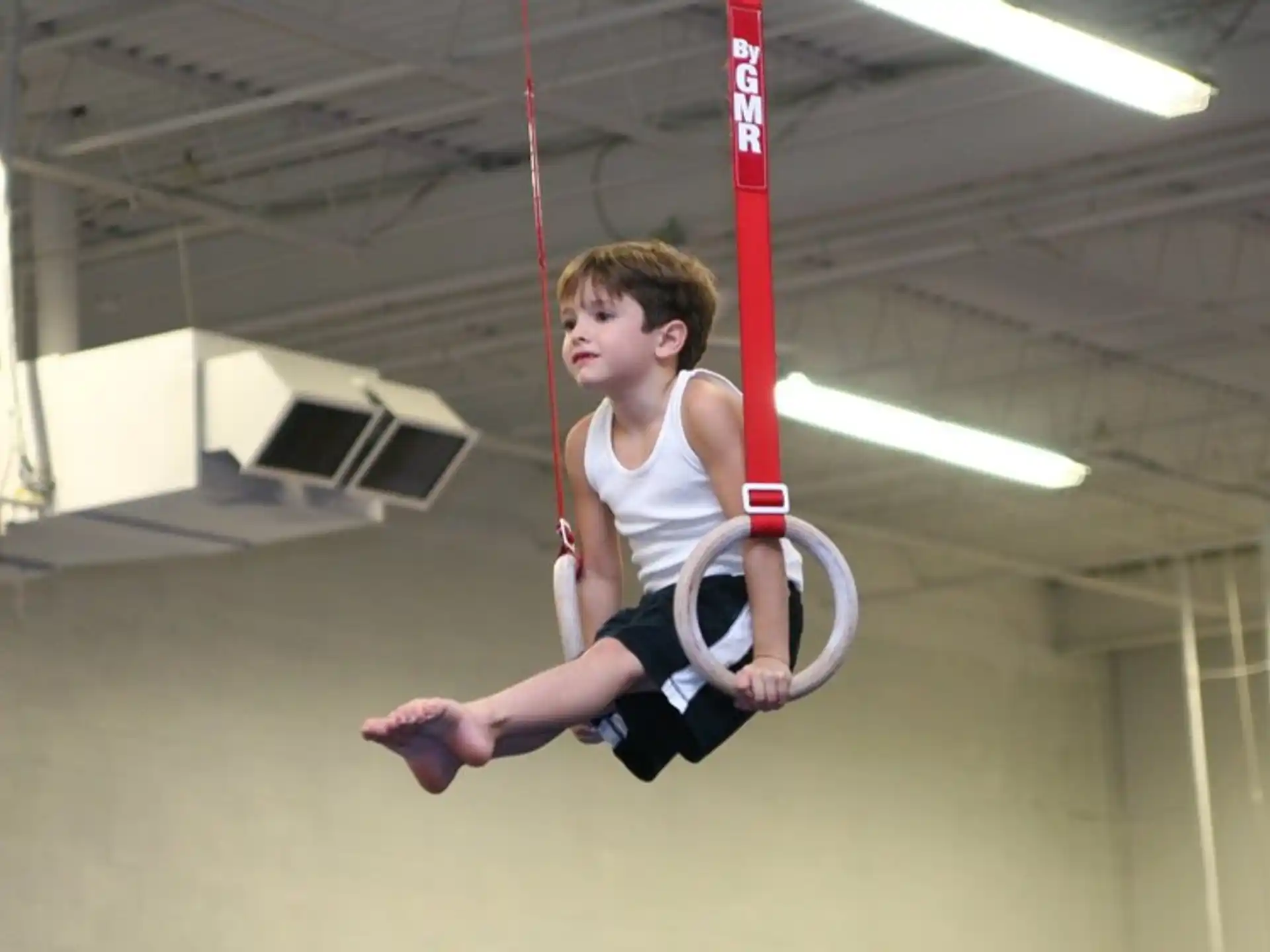 a boy on a pole